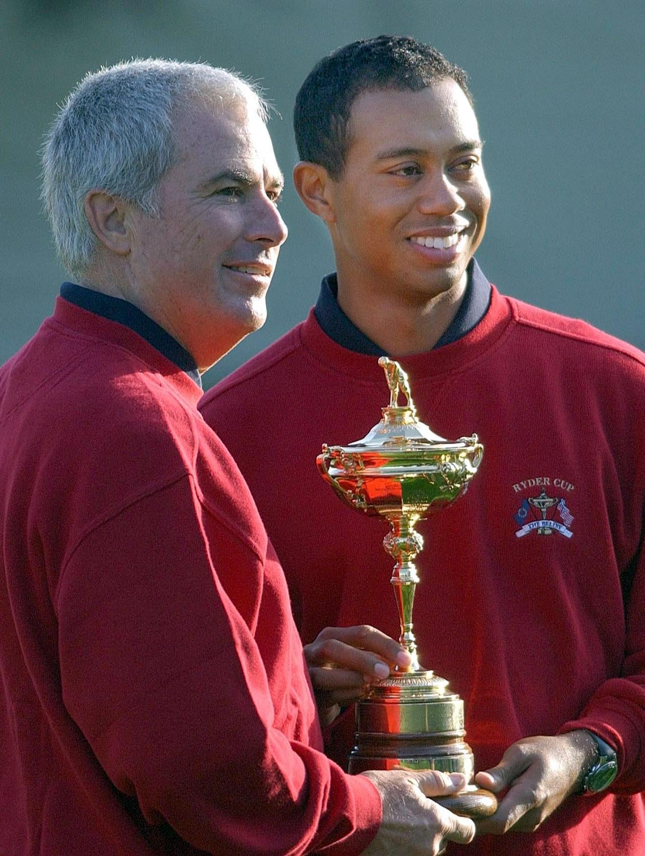 Former Ryder Cup captain Curtis Strange (left) expects more from Tiger Woods (right) in the US PGA Championship (Rebecca Naden/PA)