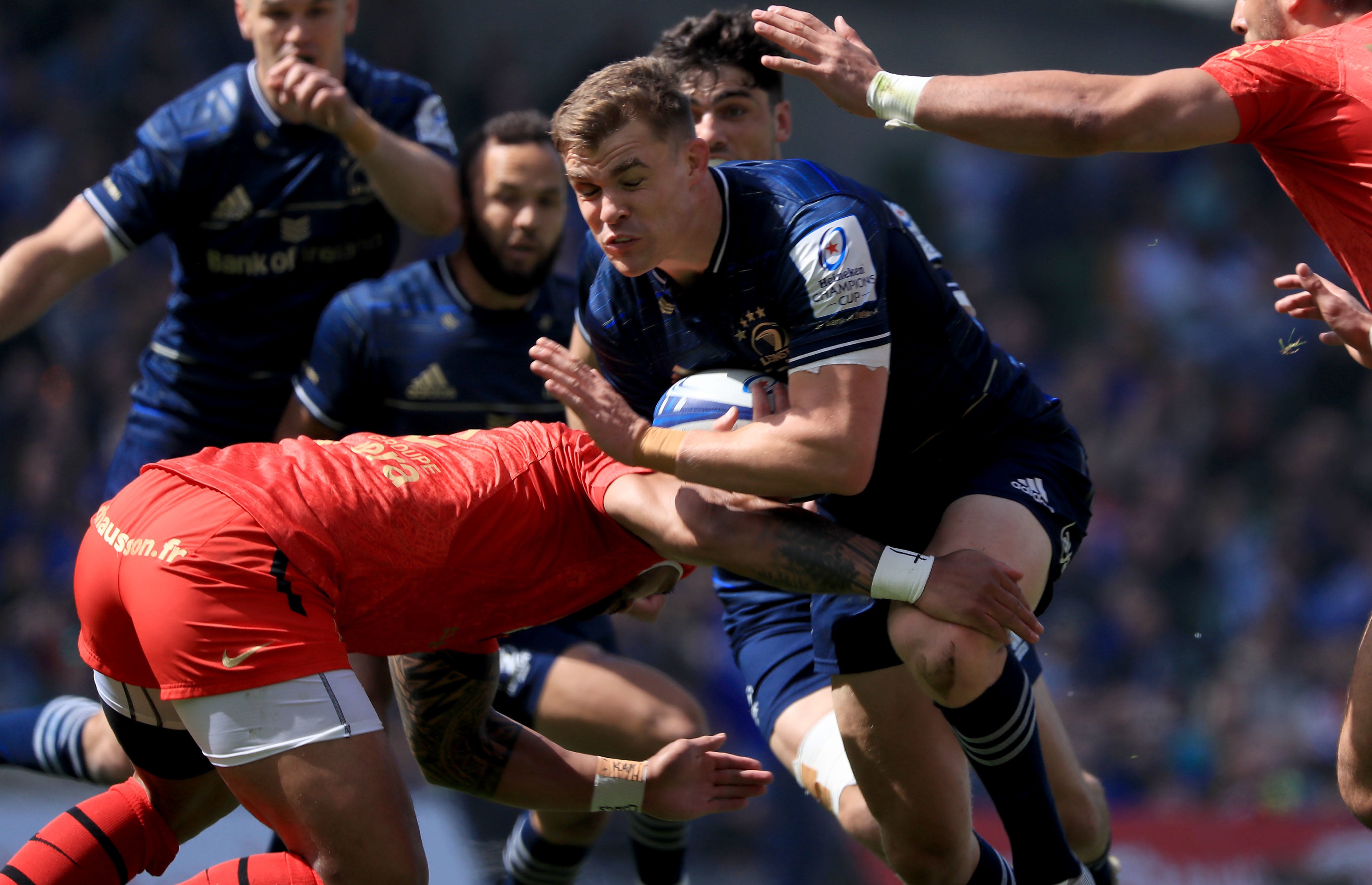 Garry Ringrose is tackled by Julien Marchand