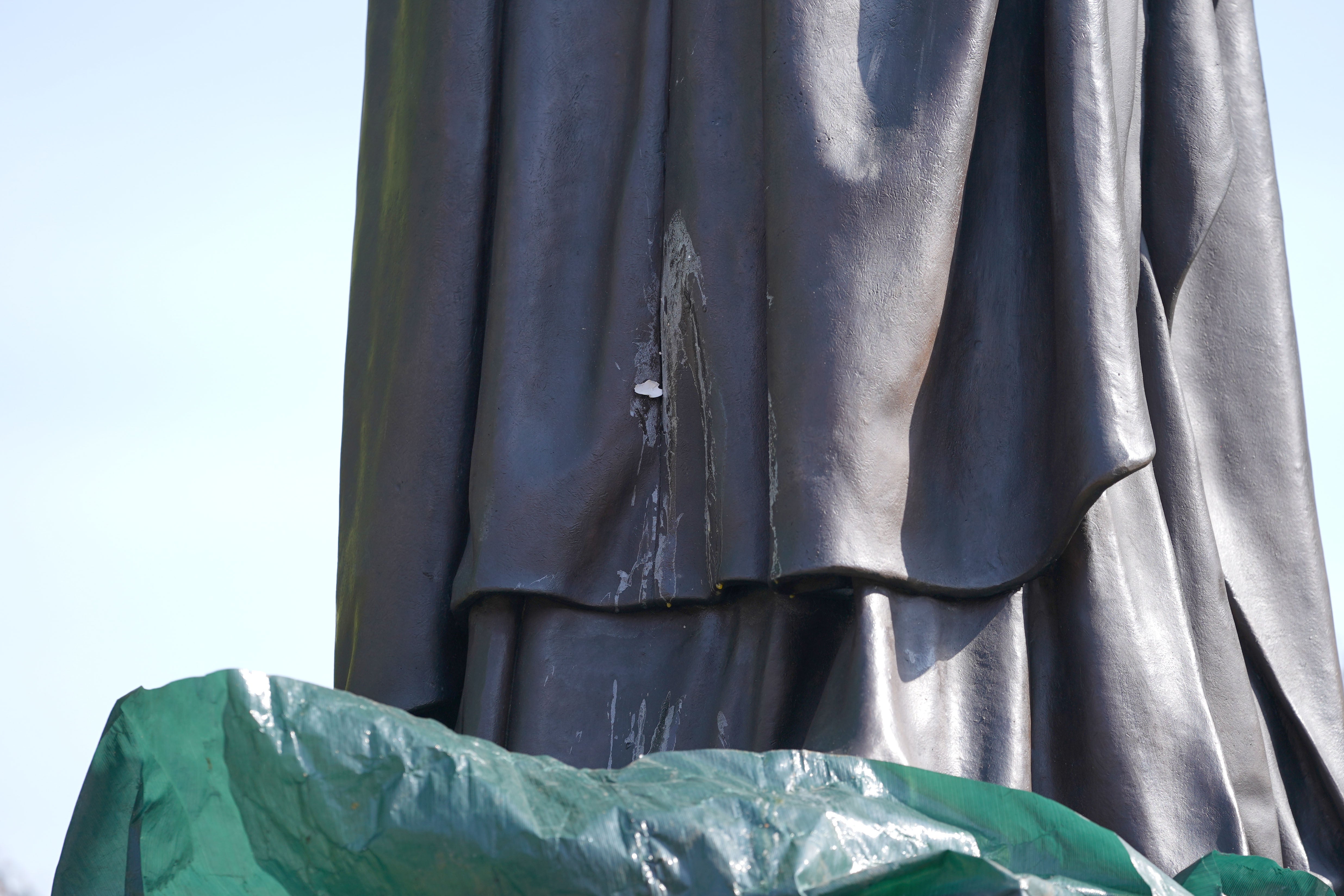 Egg drips down the newly-installed statue of Margaret Thatcher