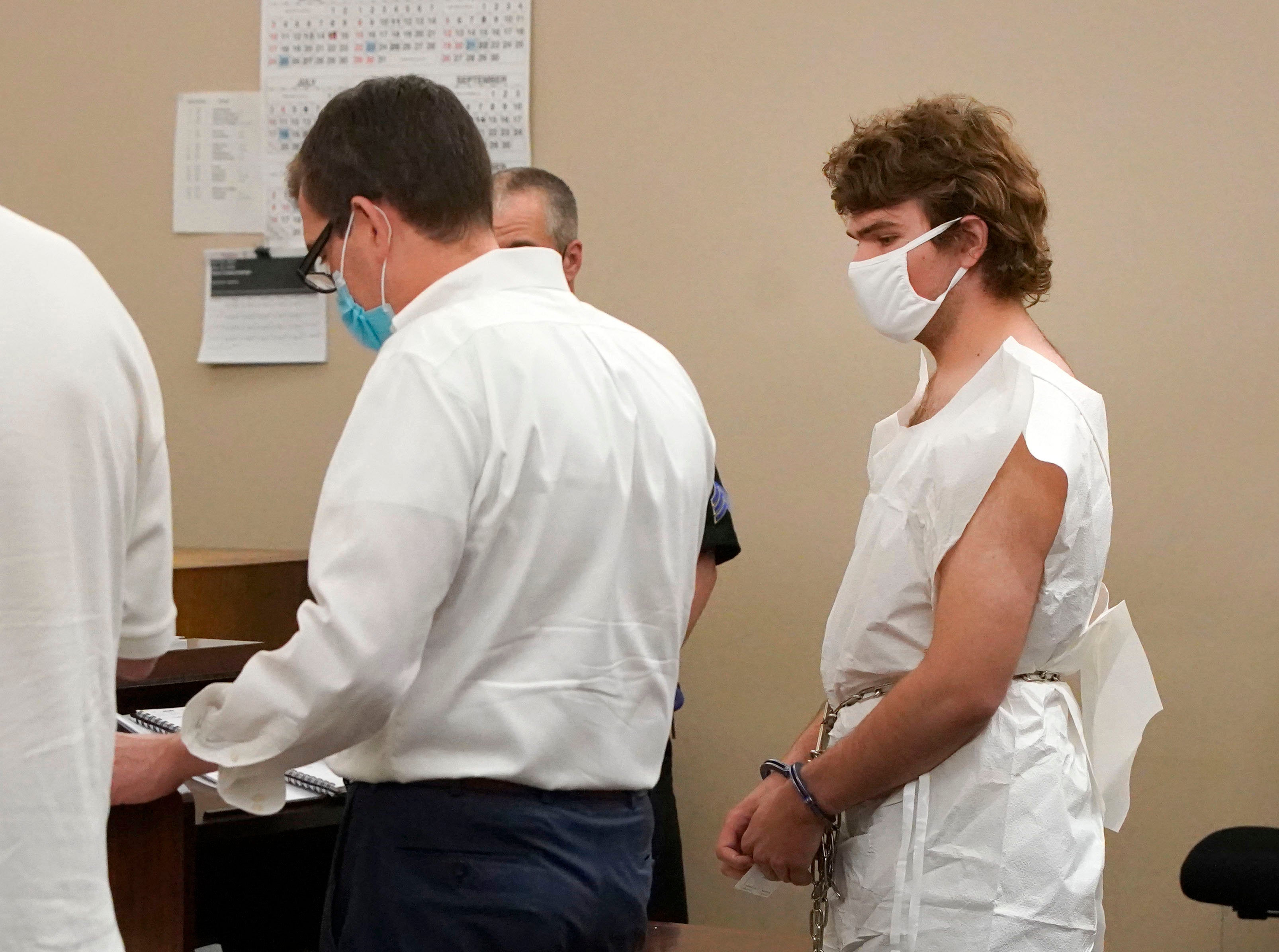 Payton Gendron talks with his attorney during his arraignment in Buffalo City Court, Saturday, May 14, 2022