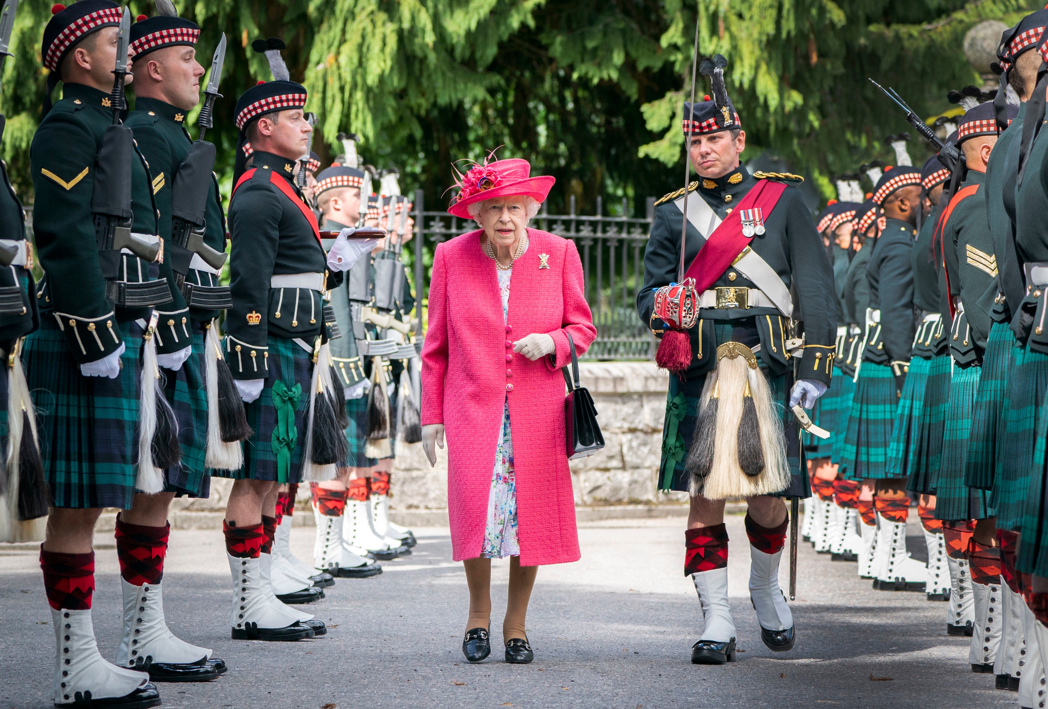 The Queen inspecting the Balaklava Company, a Scottish military division, at Balmoral in August