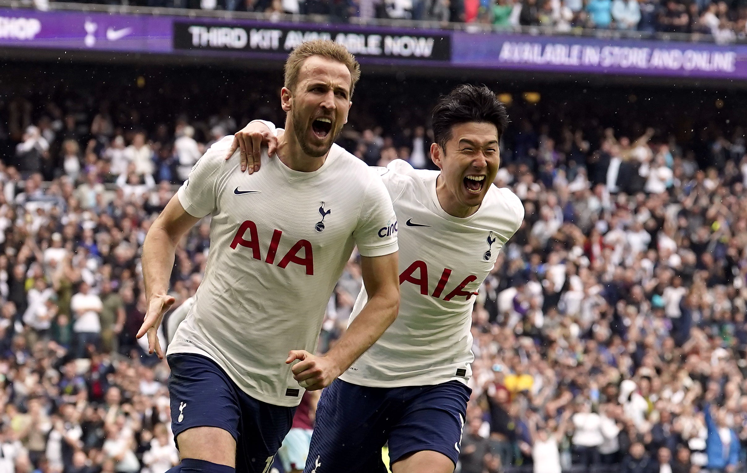 Harry Kane (left) celebrates his penalty against Burnley with strike partner Son Heung-min (Andrew Matthews/PA)