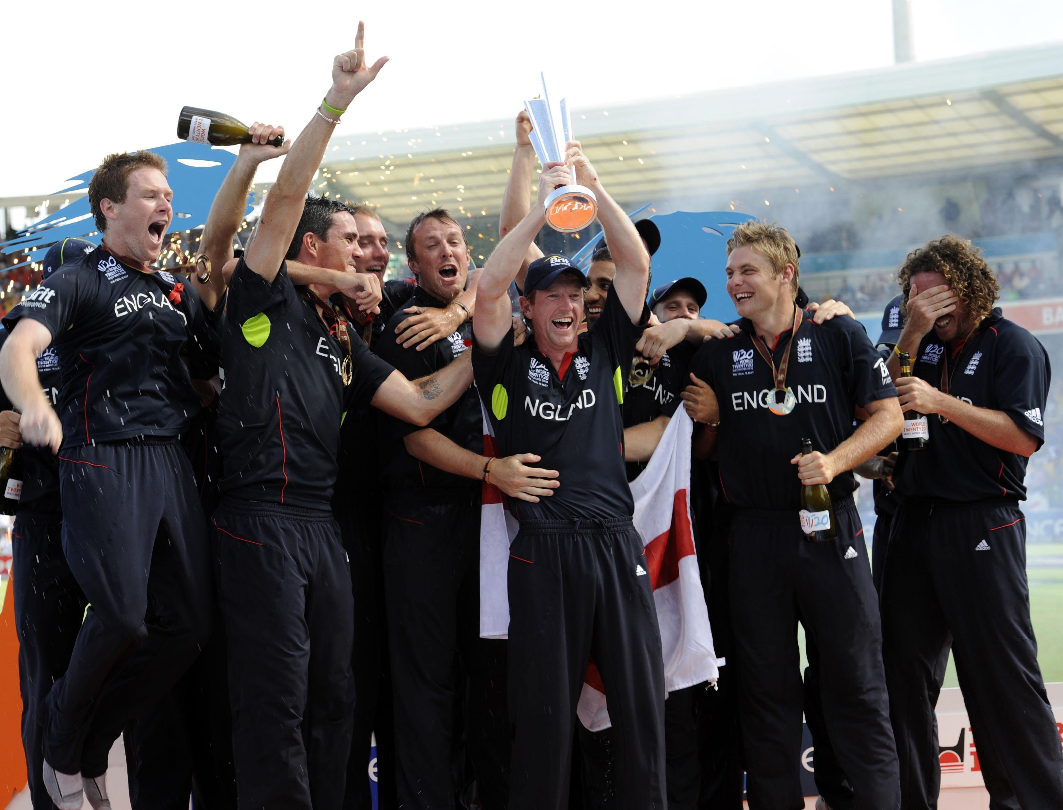 England captain Paul Collingwood (centre) lifts the trophy as they celebrate winning the ICC World Twenty20 final (Rebecca Naden/PA)