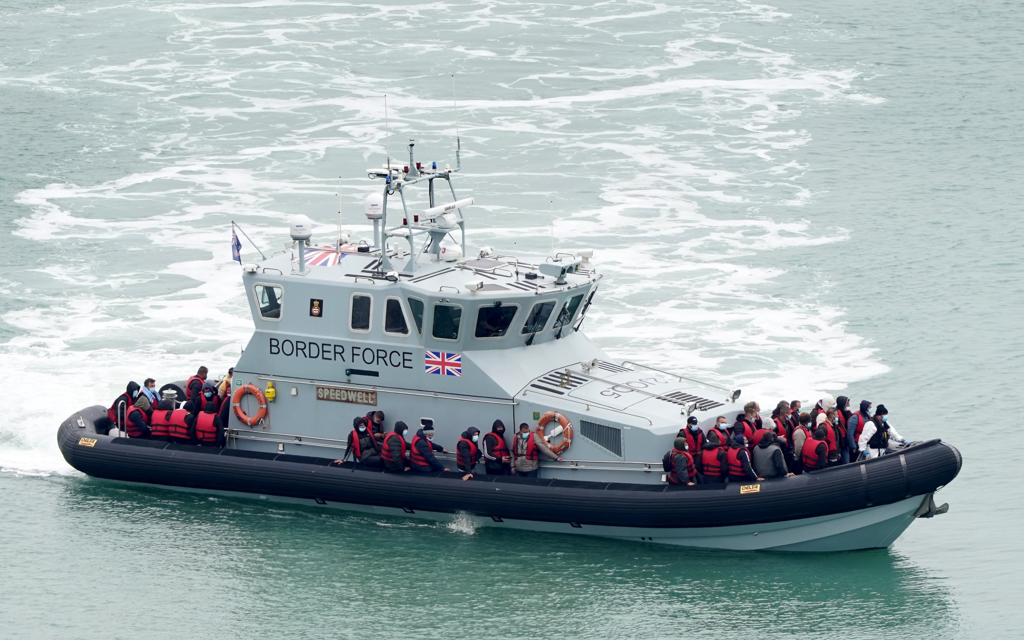 A group of people thought to be migrants are brought in to Dover, Kent, on board a Border Force vessel (Gareth Fuller/PA)