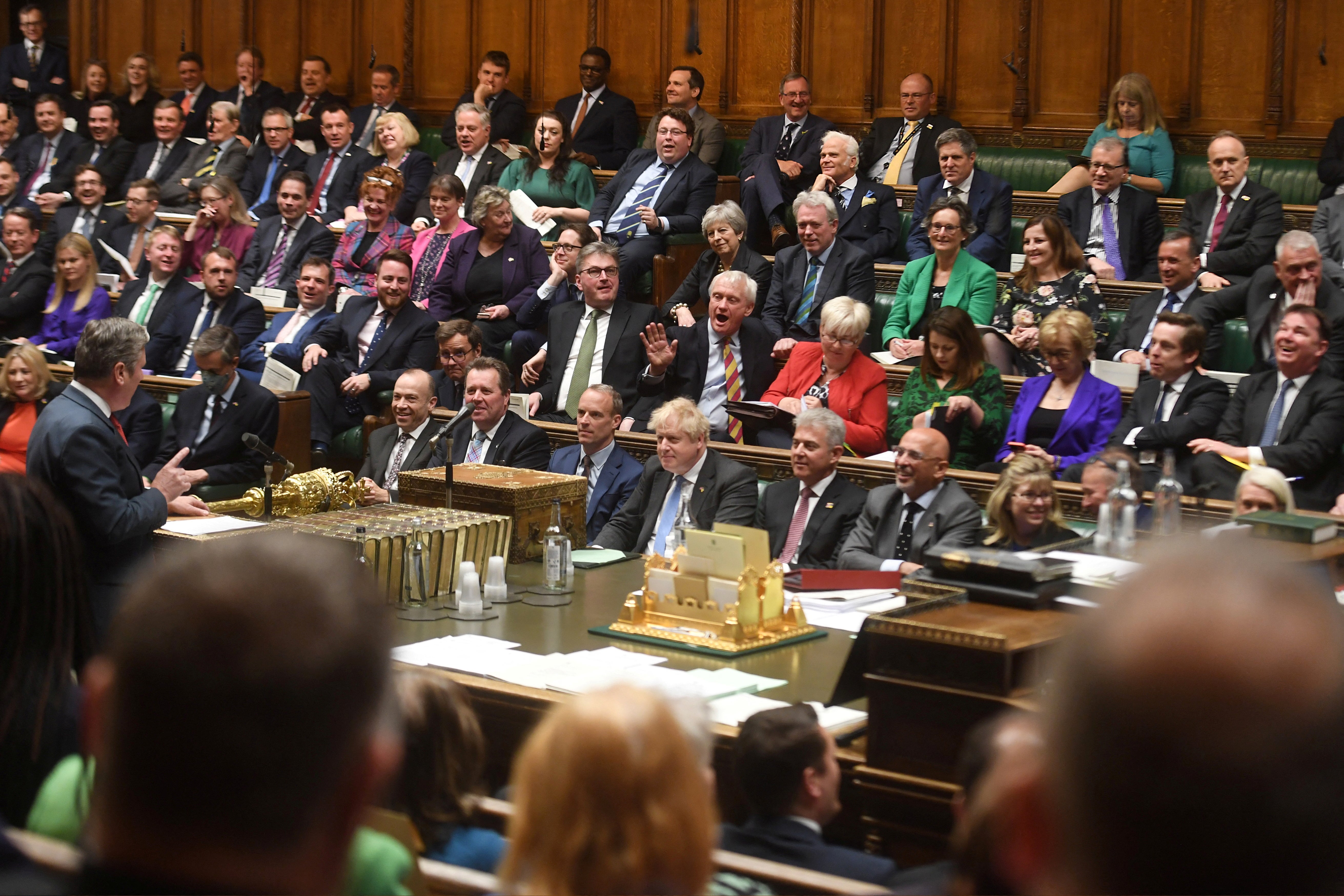 Conservative MPs sitting while Labour leader Sir Keir Starmer stands to address PM Boris Johnson at Prime Minister’s Questions