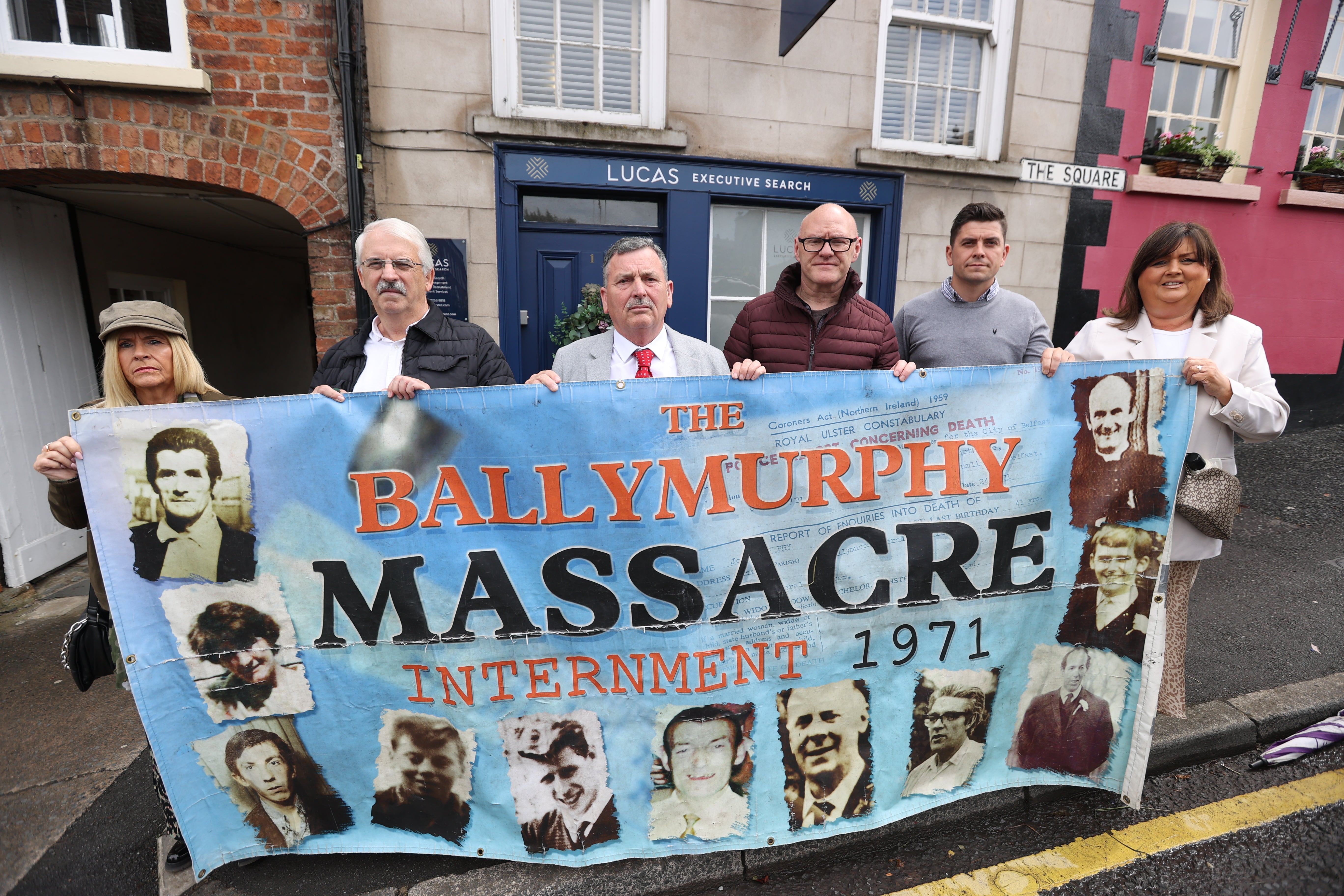 People demonstrating with some of the families of the 11 people killed by soldiers in Ballymurphy in west Belfast in 1971, outside Hillsborough Castle during a visit by Prime Minister Boris Johnson to Northern Ireland for talks with Stormont parties. Picture date: Monday May 16, 2022 (Liam McBurney/PA)