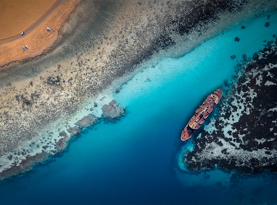 Enjoy incredible views and immerse yourself in nature at Shipwreck Beach in Haql