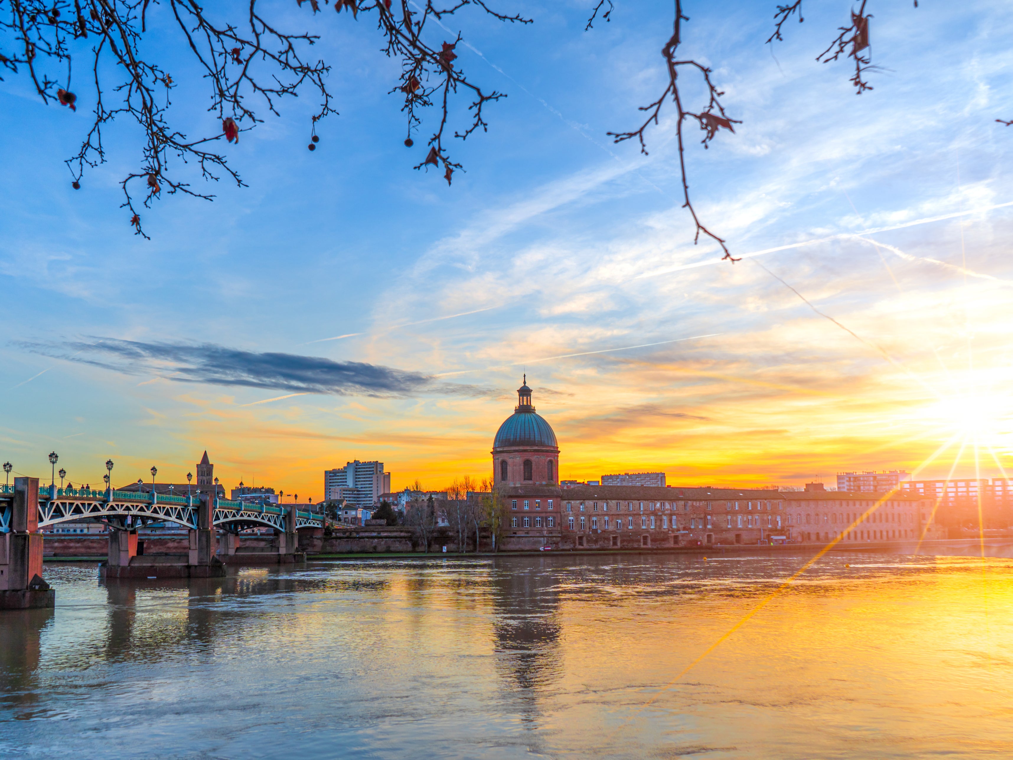 The Garonne river and Dome de la Grave in Toulouse, France