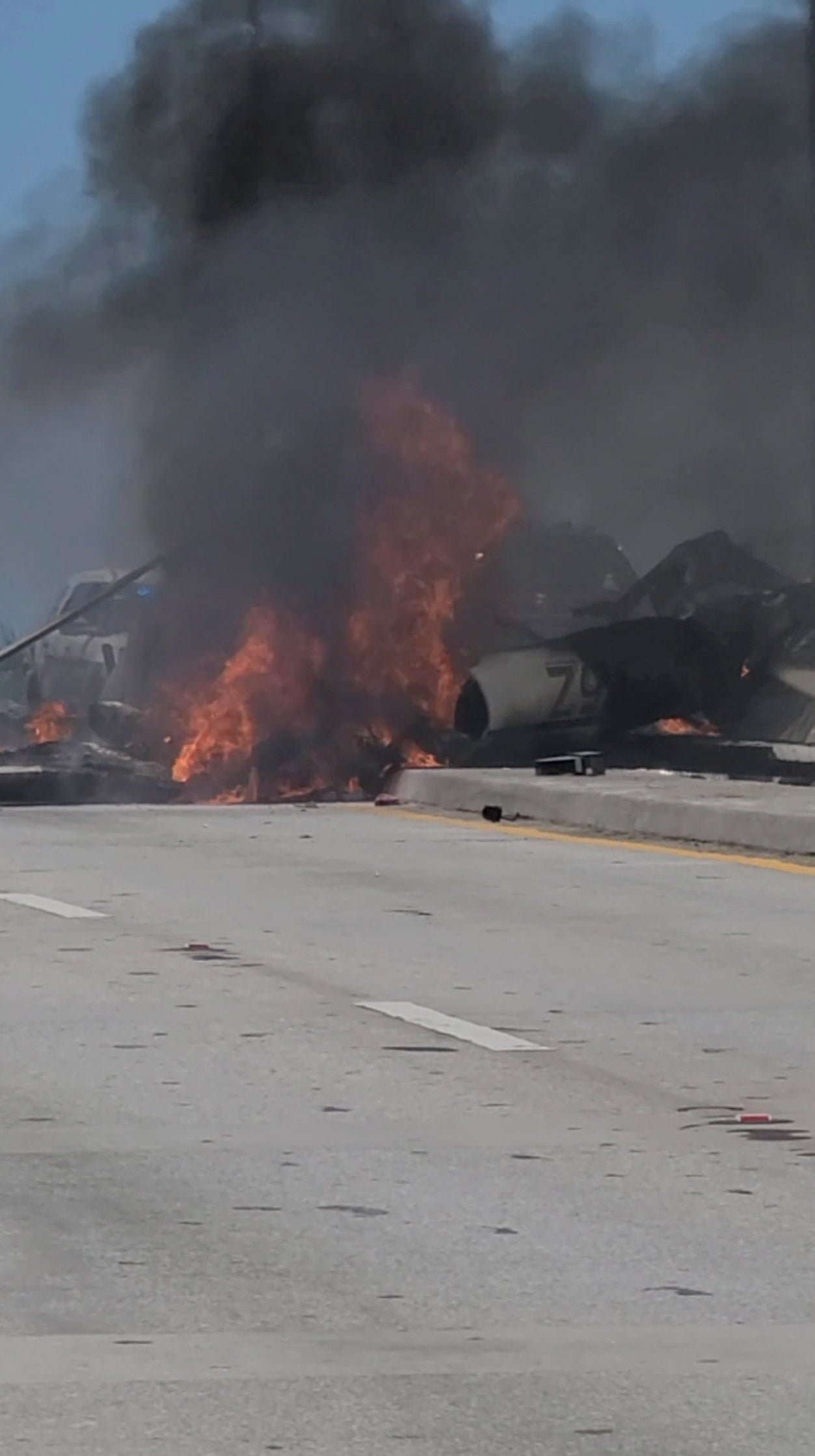 Plane crashes onto Haulover Inlet Bridge, Miami