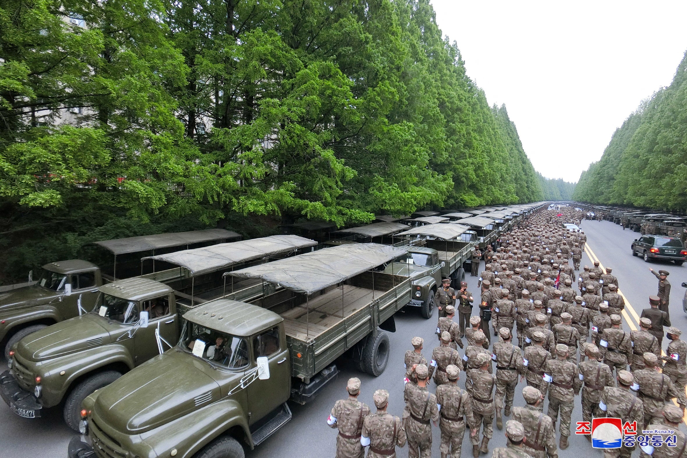 Military medical corps attend the launch of a campaign to improve the supply of medicines in Pyongyang