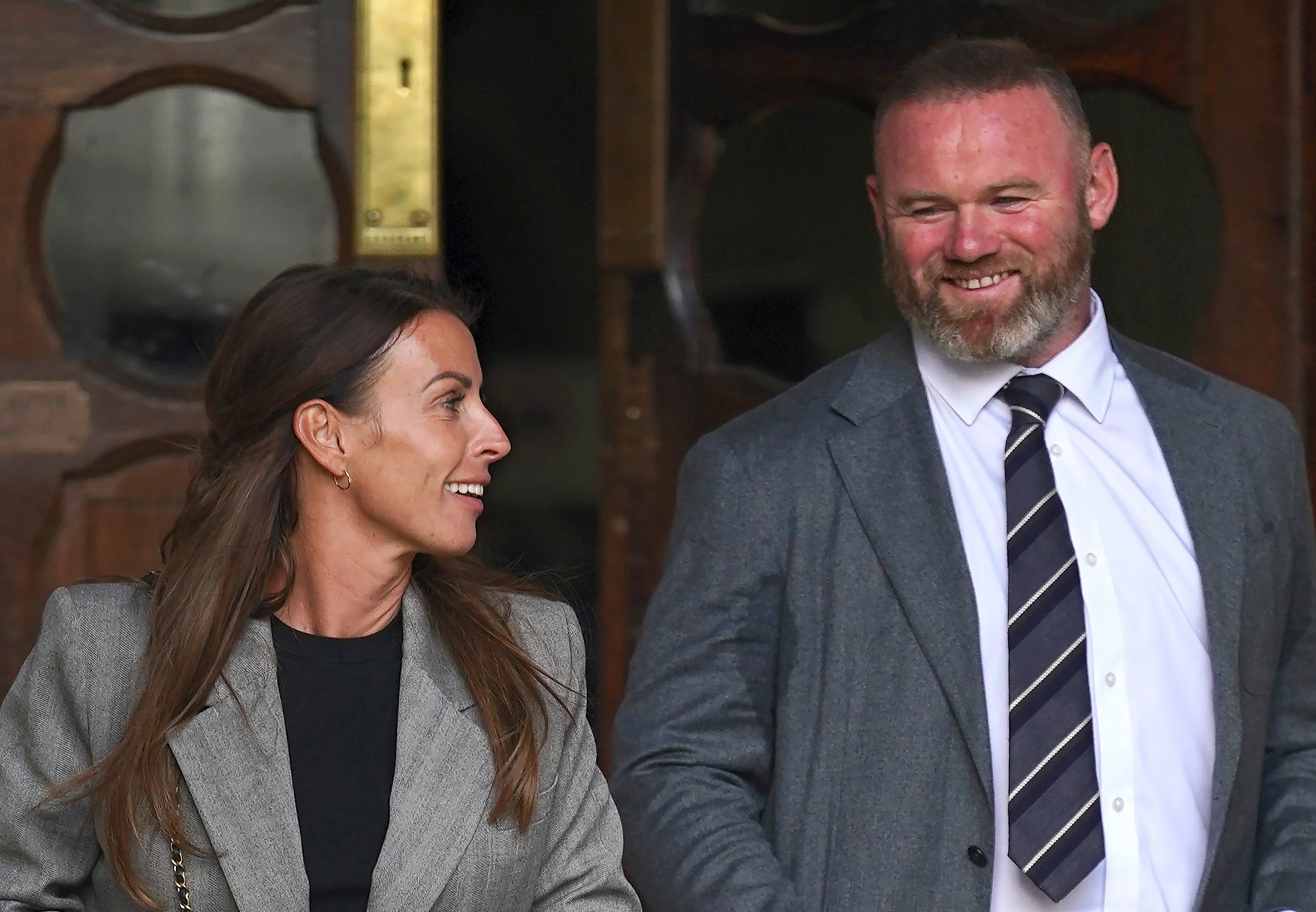 Coleen and Wayne Rooney at the Royal Courts Of Justice (PA)