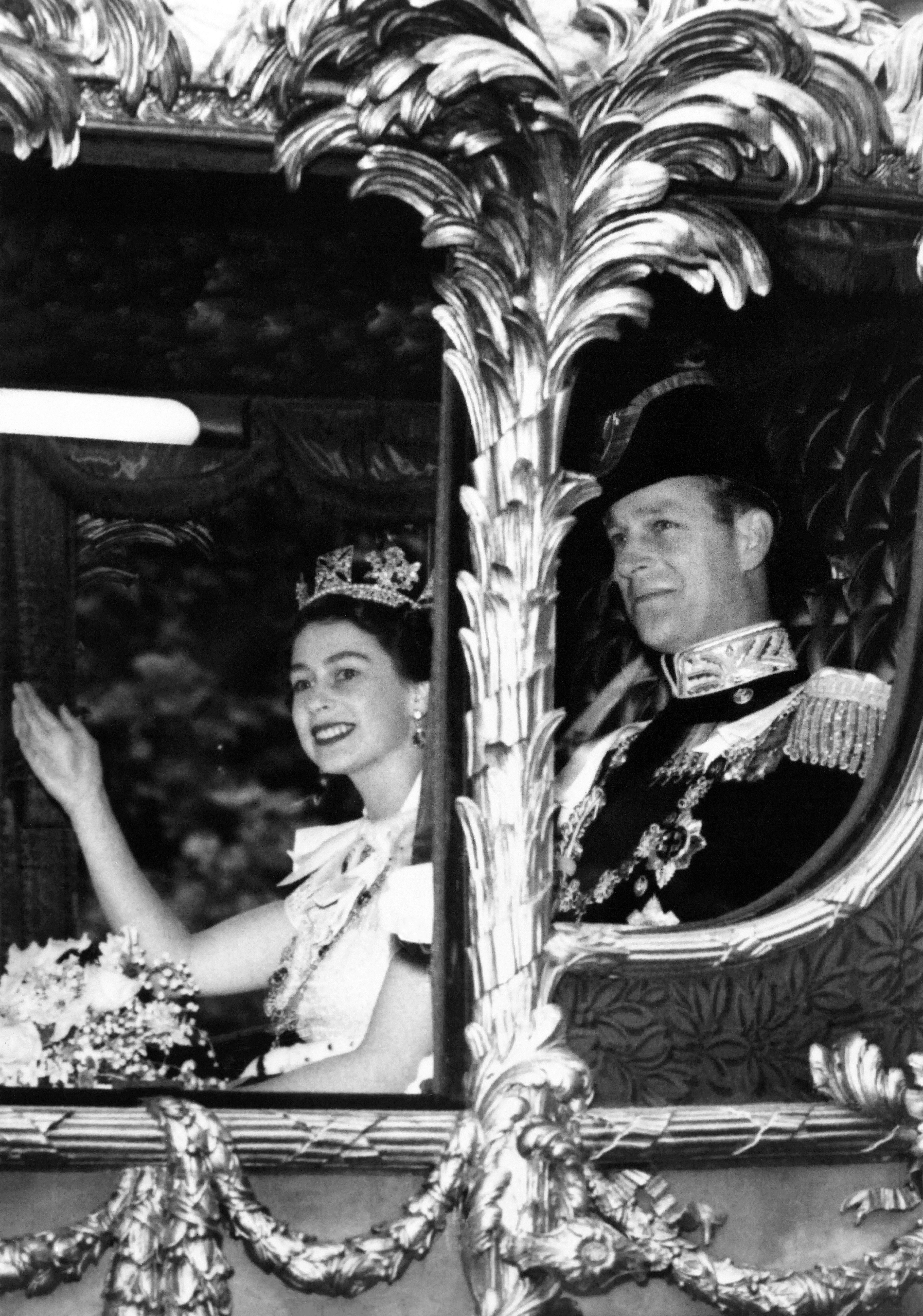 The Queen and Prince Philip in the horse-drawn carriage on the way to Westminster Abbey on 2 June 1953