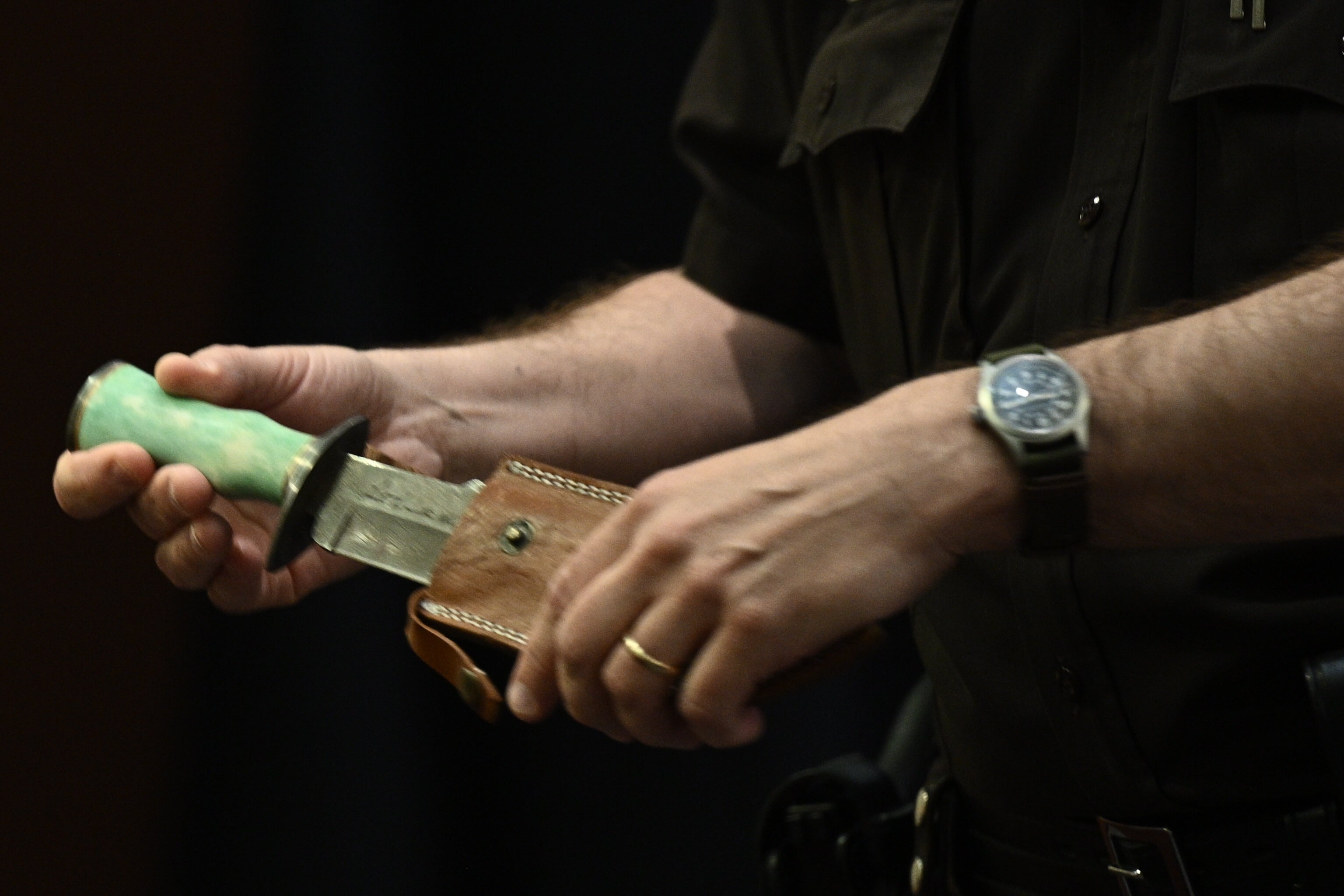 A Fairfax County Deputy Sheriff officer holds the knife that Amber Heard gifted to actor Johnny Depp