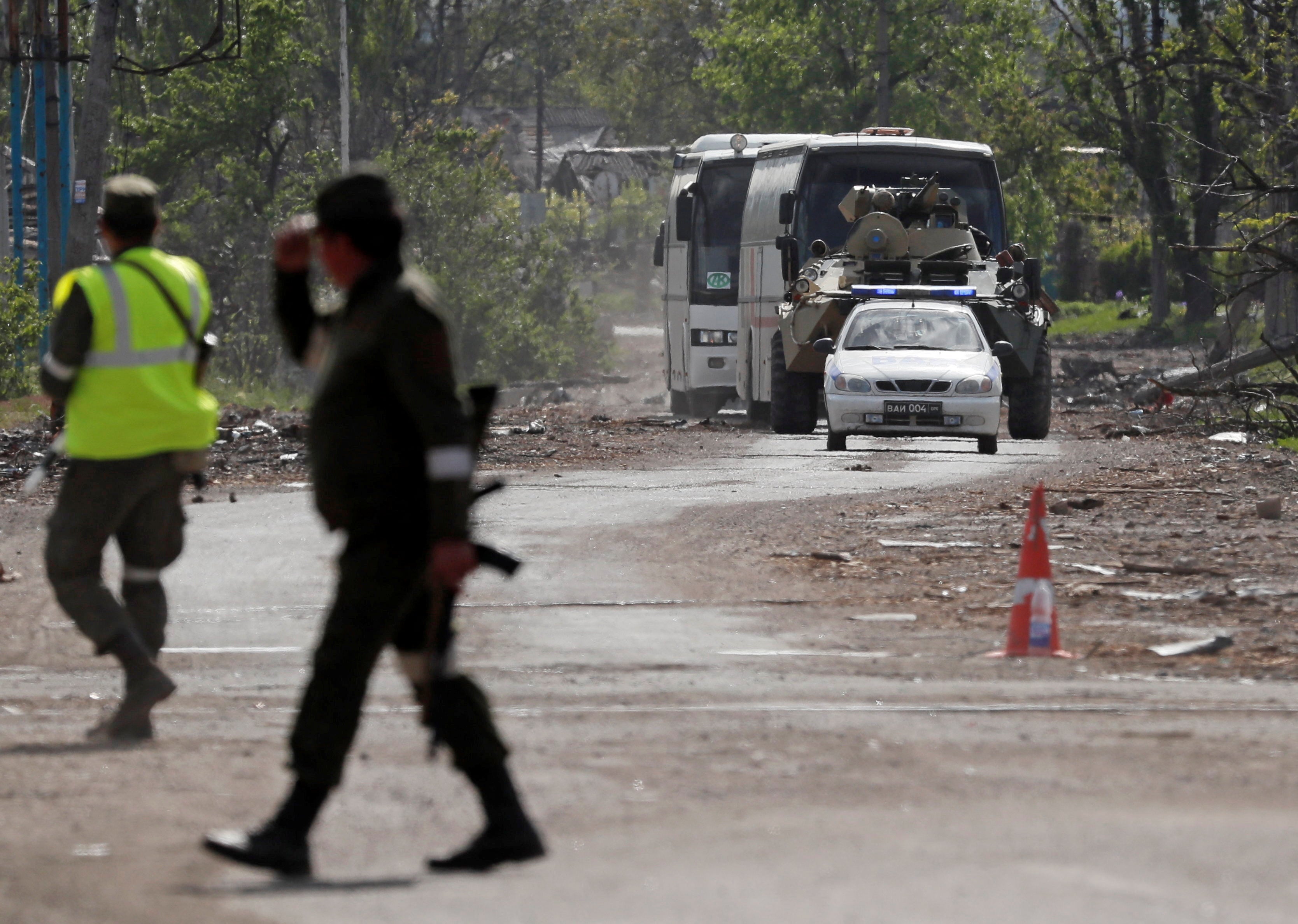 Buses carrying service members of Ukrainian forces