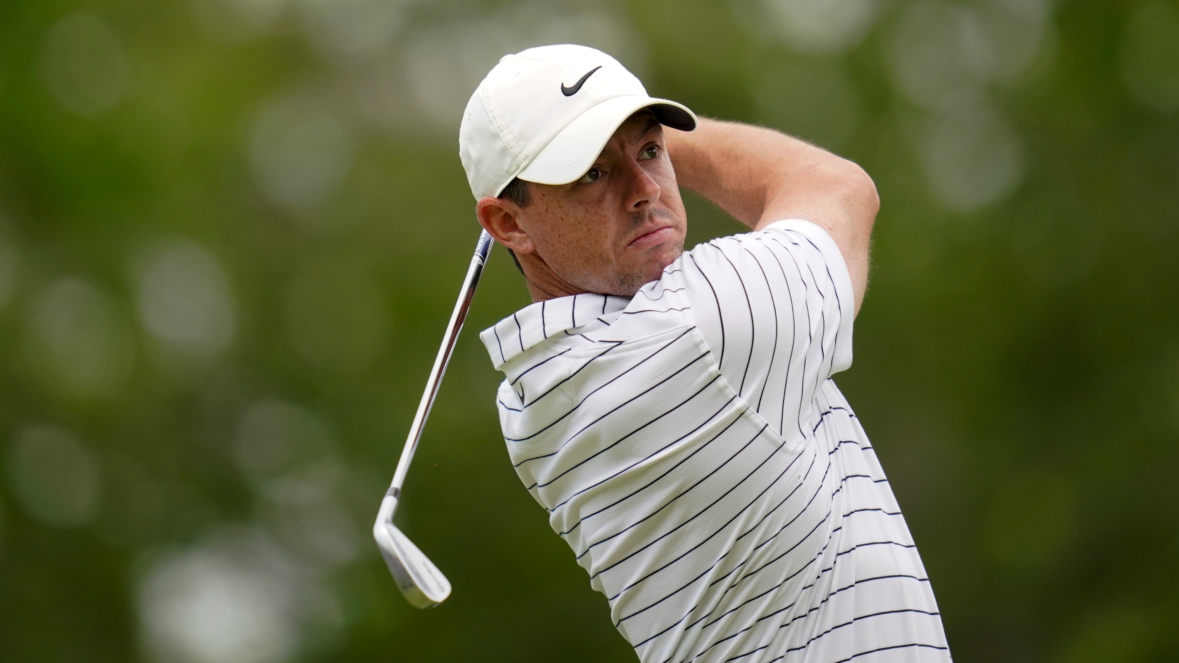 Rory McIlroy watches his tee shot during a practice round for the US PGA Championship (Sue Ogrocki/AP)