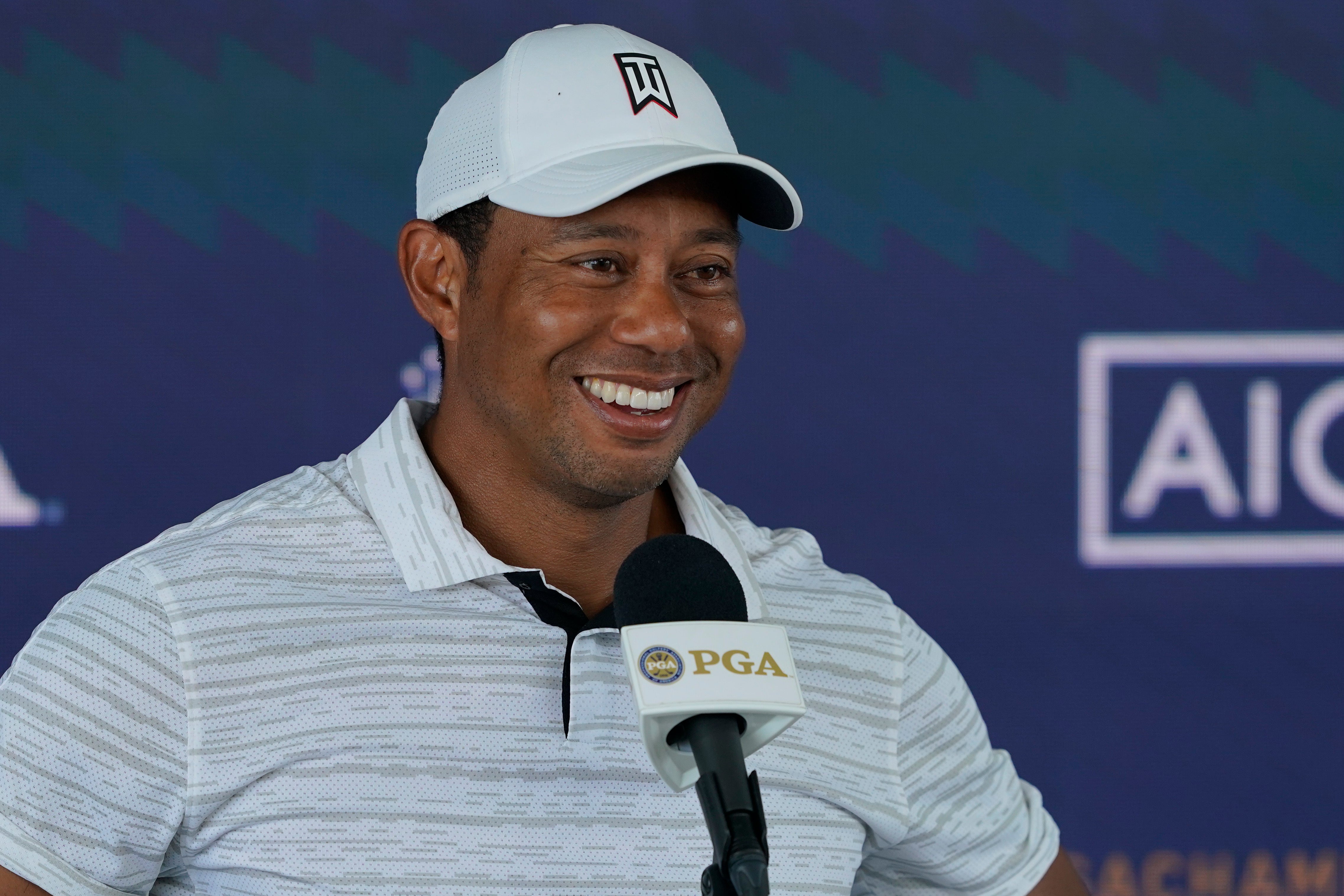 Tiger Woods speaks to the media ahead of the US PGA Championship at Southern Hills (Matt York/AP)