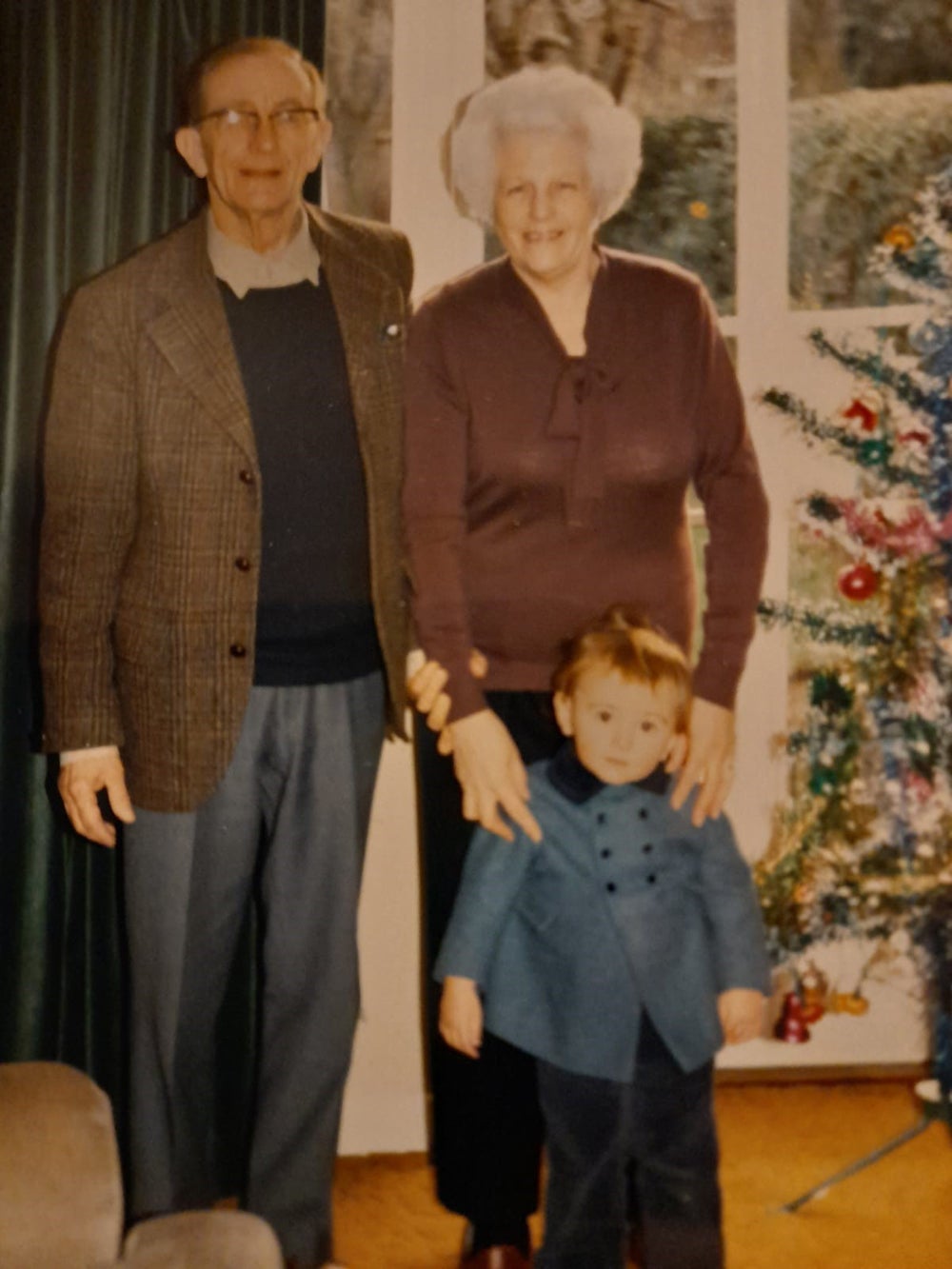 Bert’s parents, Richard and Solange, with his son, David, aat Christmas in 1984 (Collect/PA Real Life)