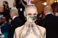 Grimes is selling her futuristic Met Gala accessories to raise money for Ukraine