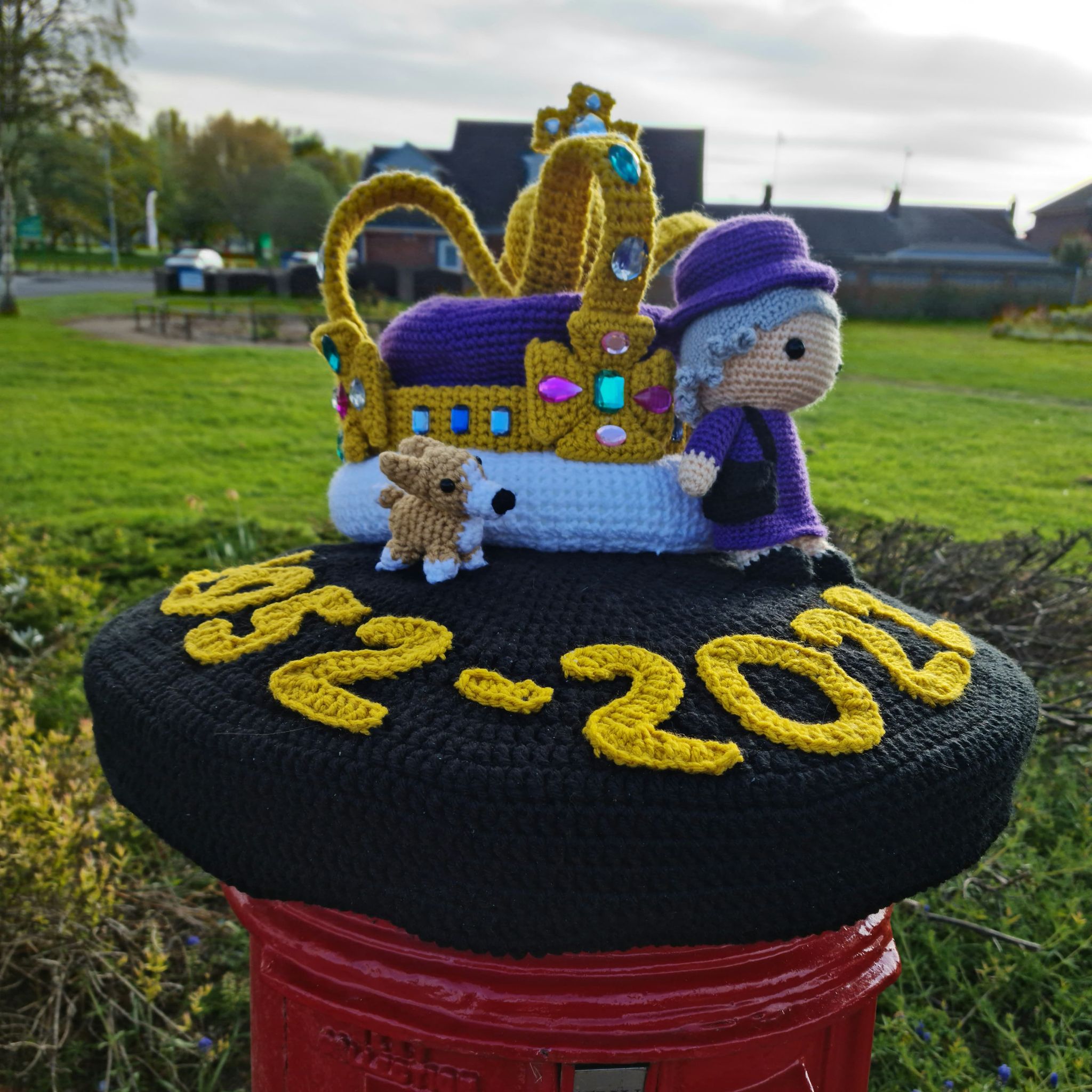 Jasmine Colley even gave her Queen a crochet corgi to sit with (Jasmine Colley/PA)