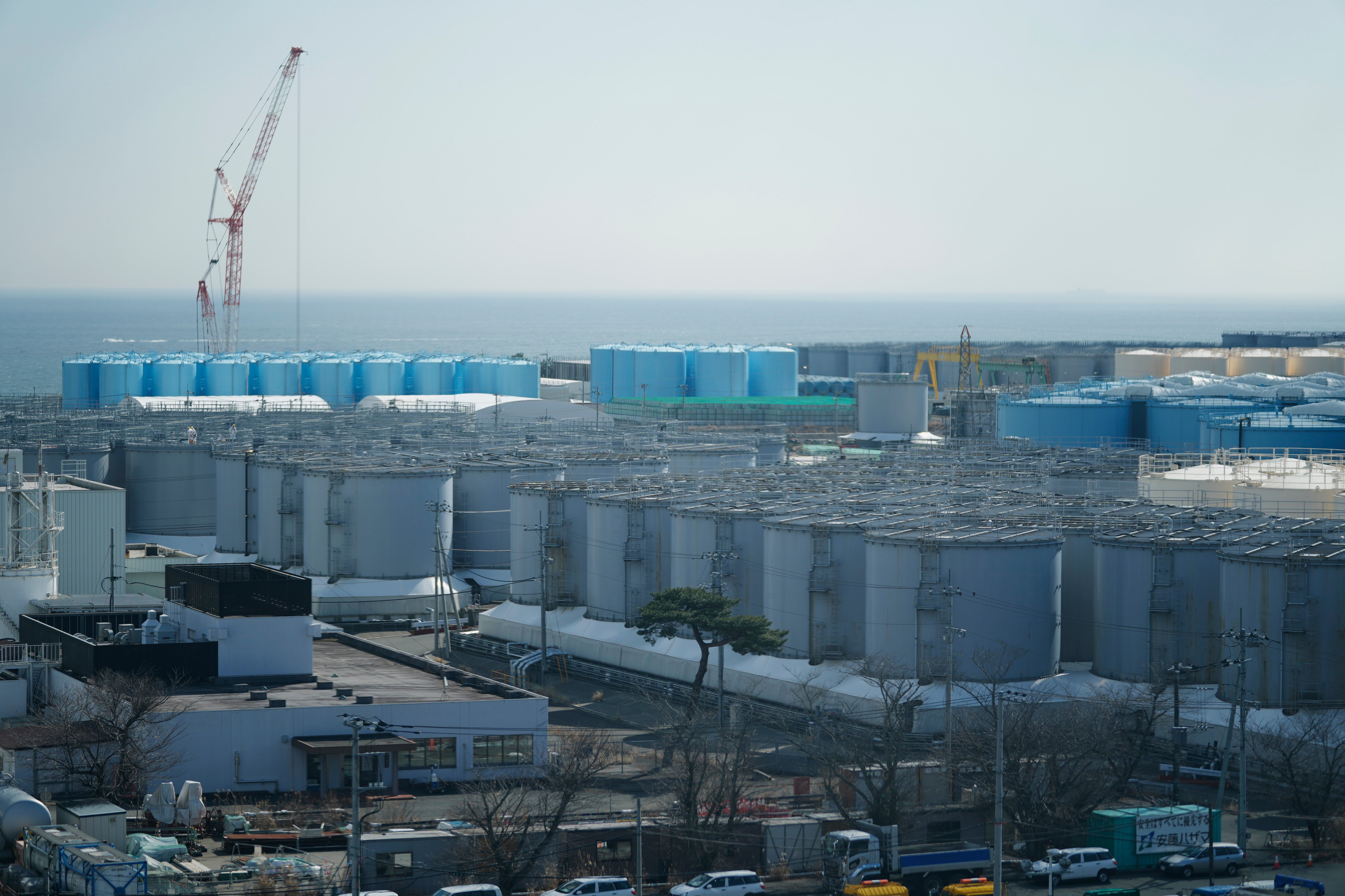 Tanks storing treated radioactive water after it was used to cool the melted fuel are seen at the Fukushima Daiichi nuclear power plant