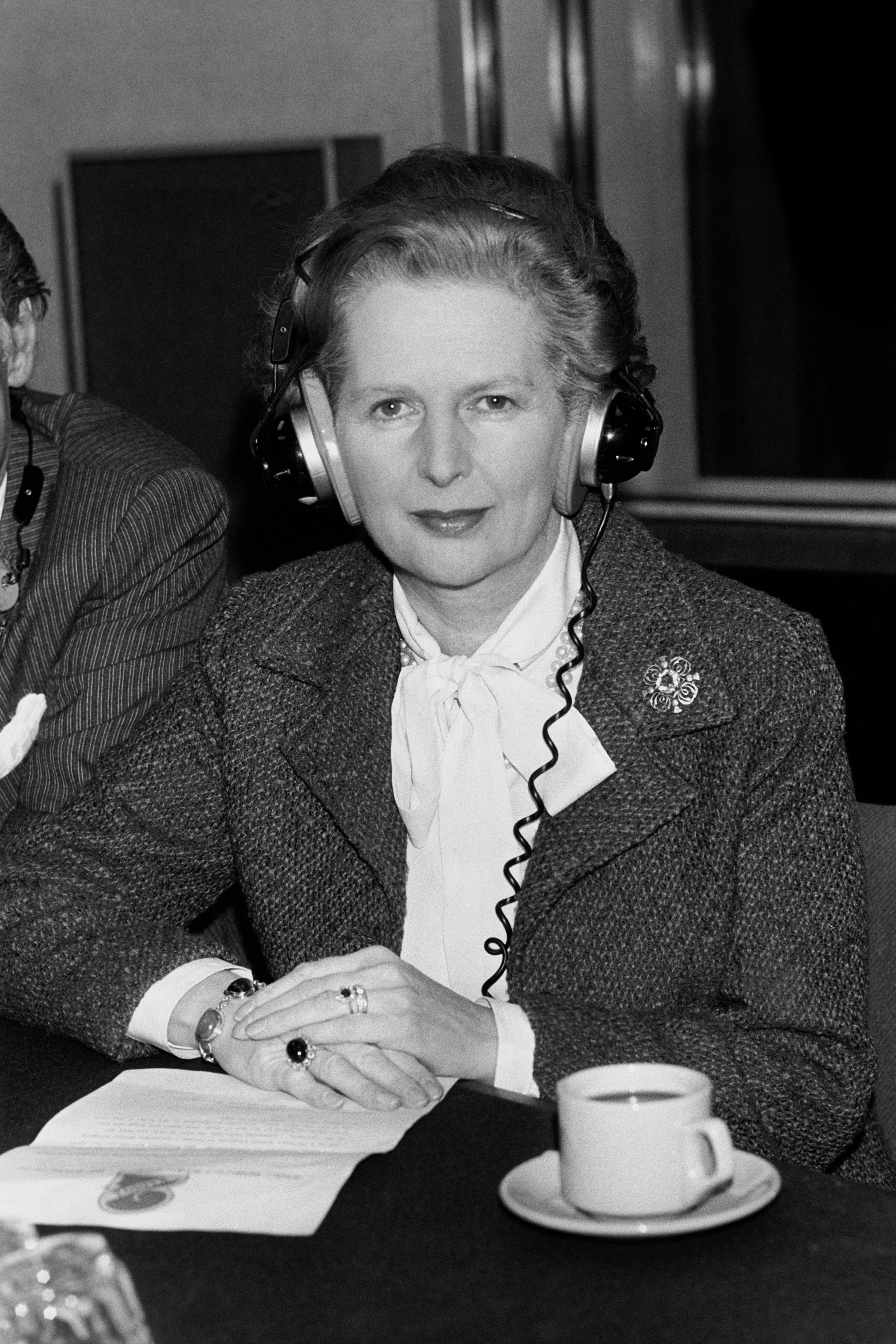 Prime Minister Margaret Thatcher wears earphones during an interview at the BBC’s Broadcasting House in March 1982 (PA)