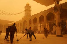 Huge sandstorms sweep across Middle East, leading to closure of schools and government offices