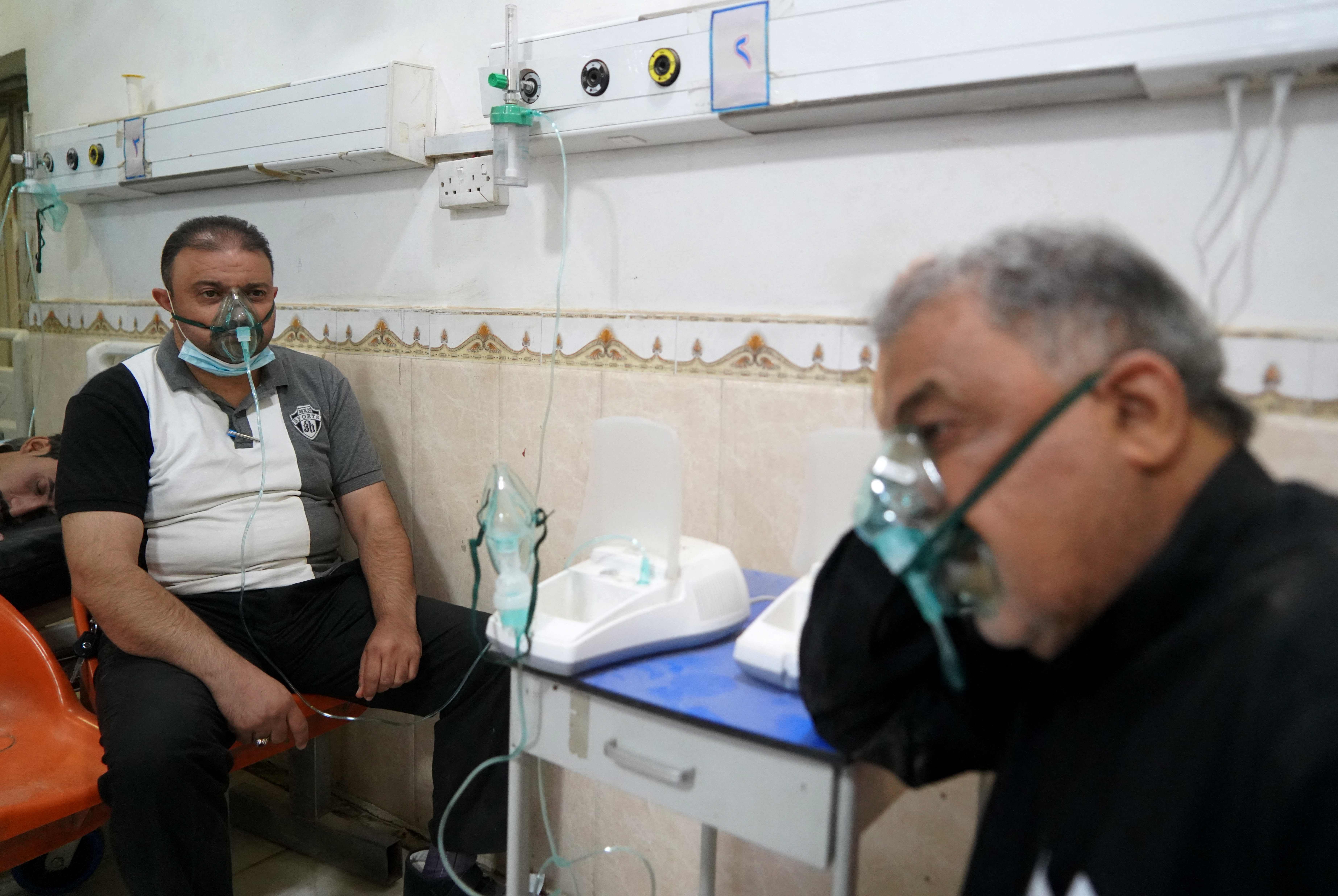 Patients receive medical care at the al-Hakim hospital during a sandstorm in Iraq’s holy city of Najaf on 16 May 2022