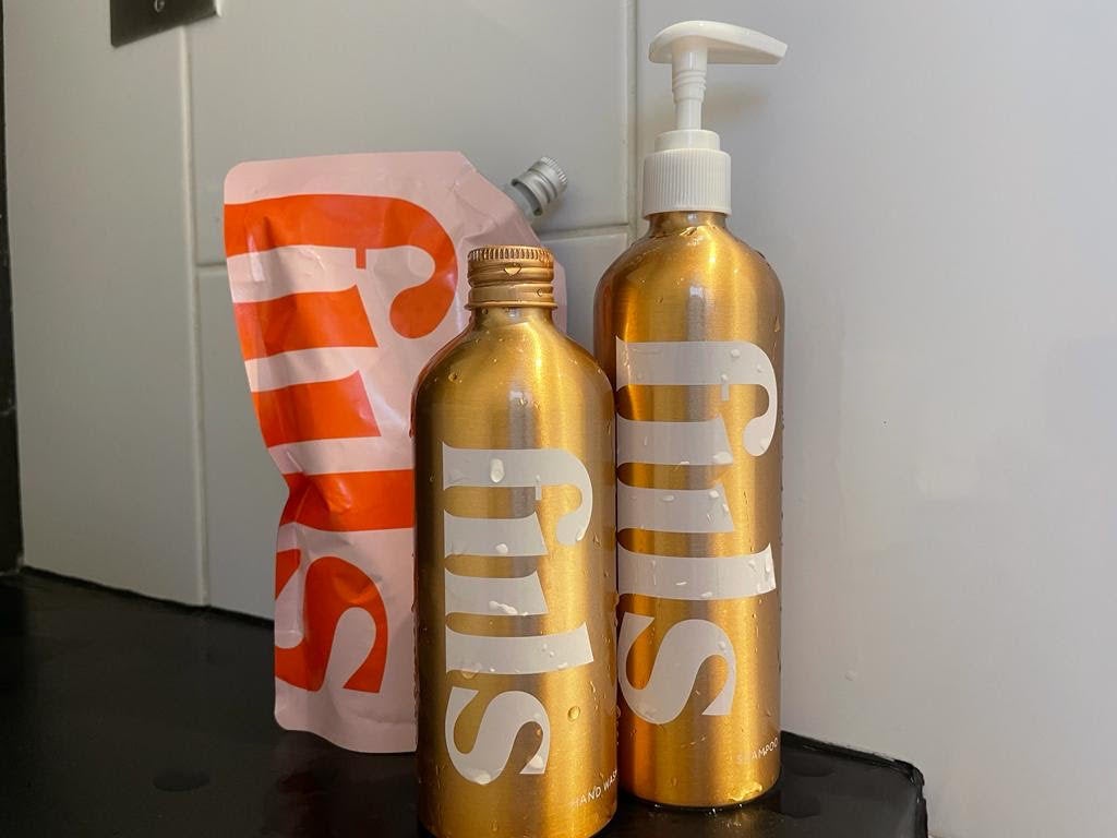 The metallic bottles brought sophistication to the mishmash of products in our bathroom