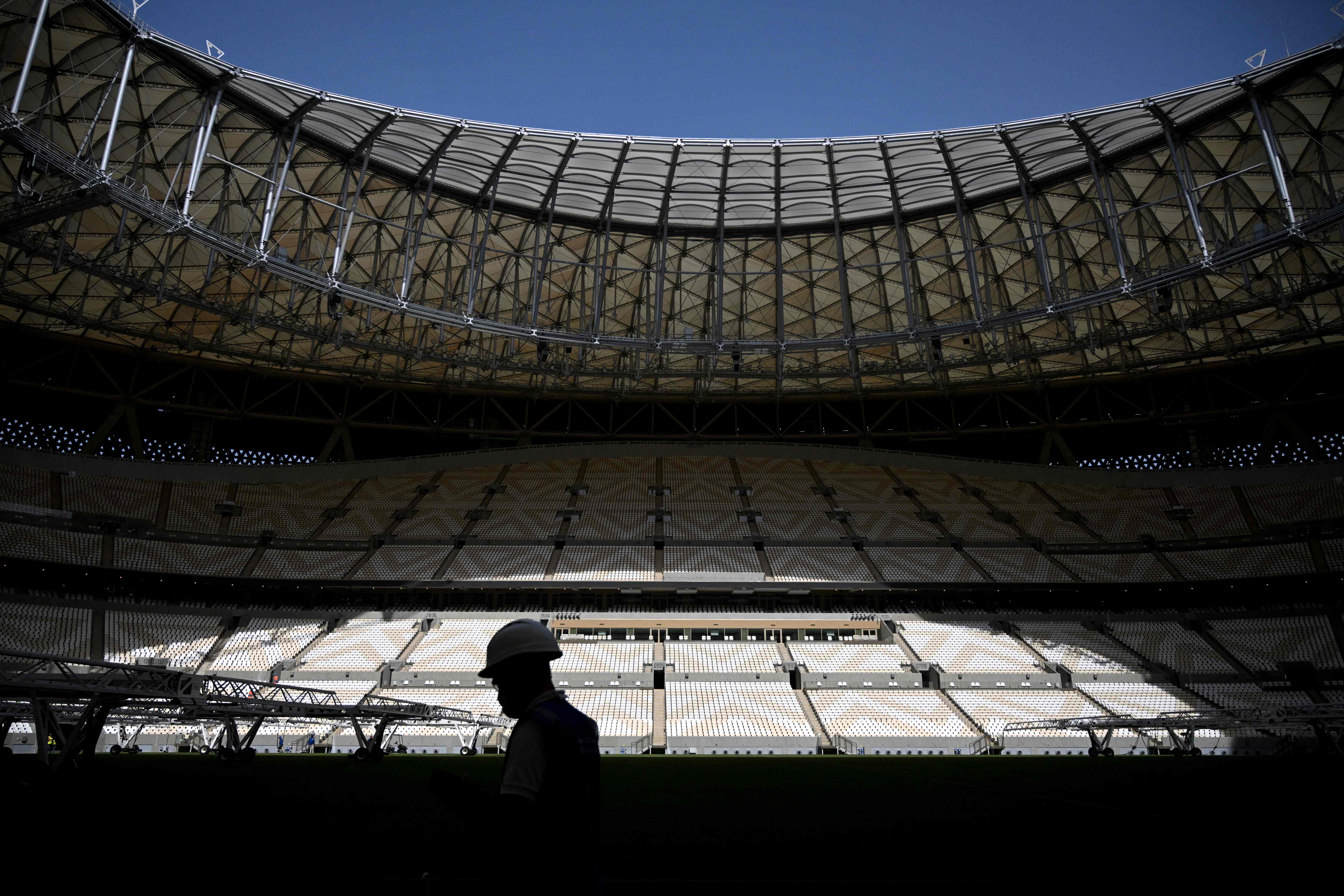 A worker is pictured at the Lusail Stadium in Doha, Qatar, on 28 March, 2022