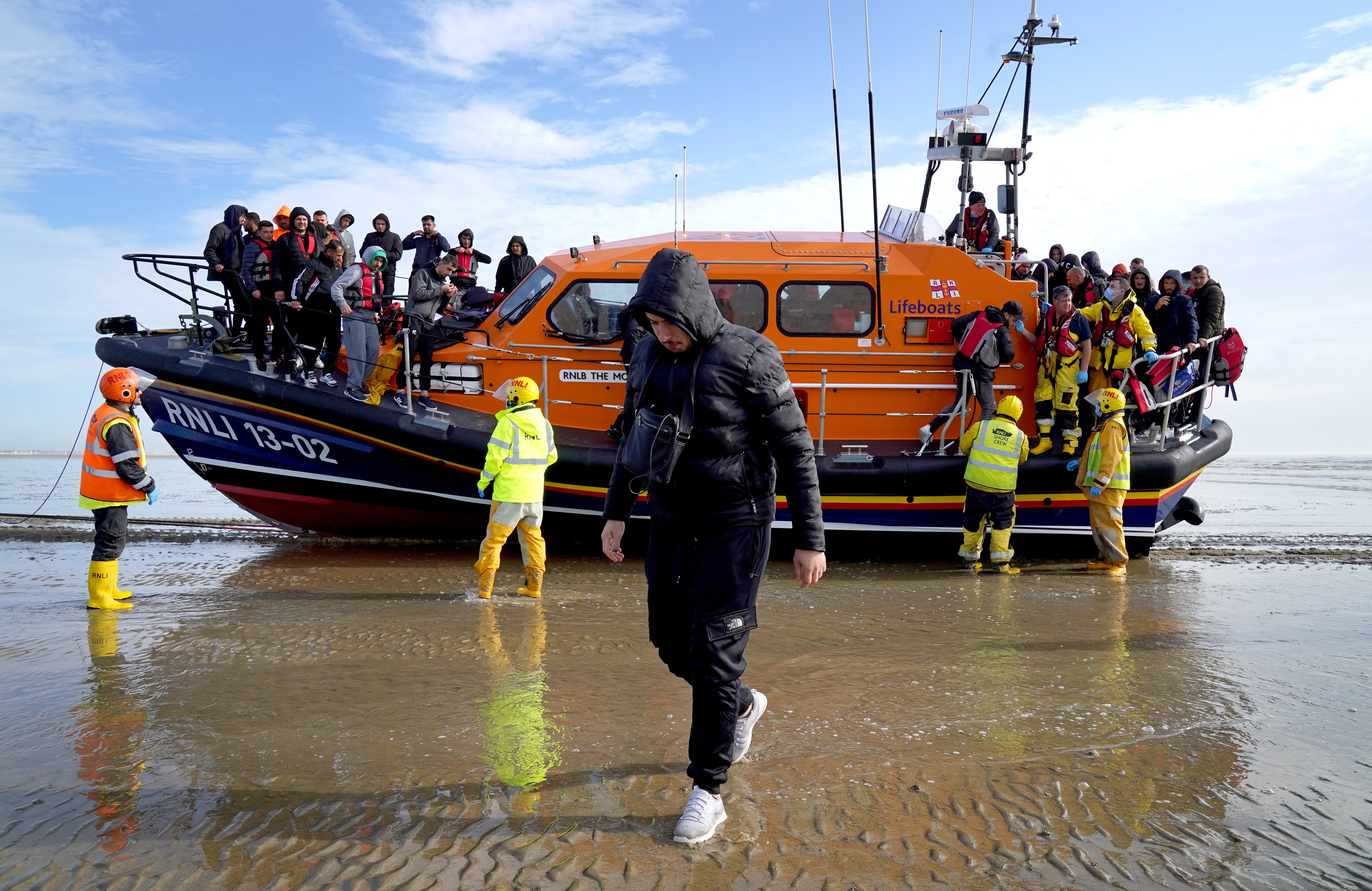 A group of people thought to be migrants are brought in to Dungeness, Kent (Gareth Fuller/PA)