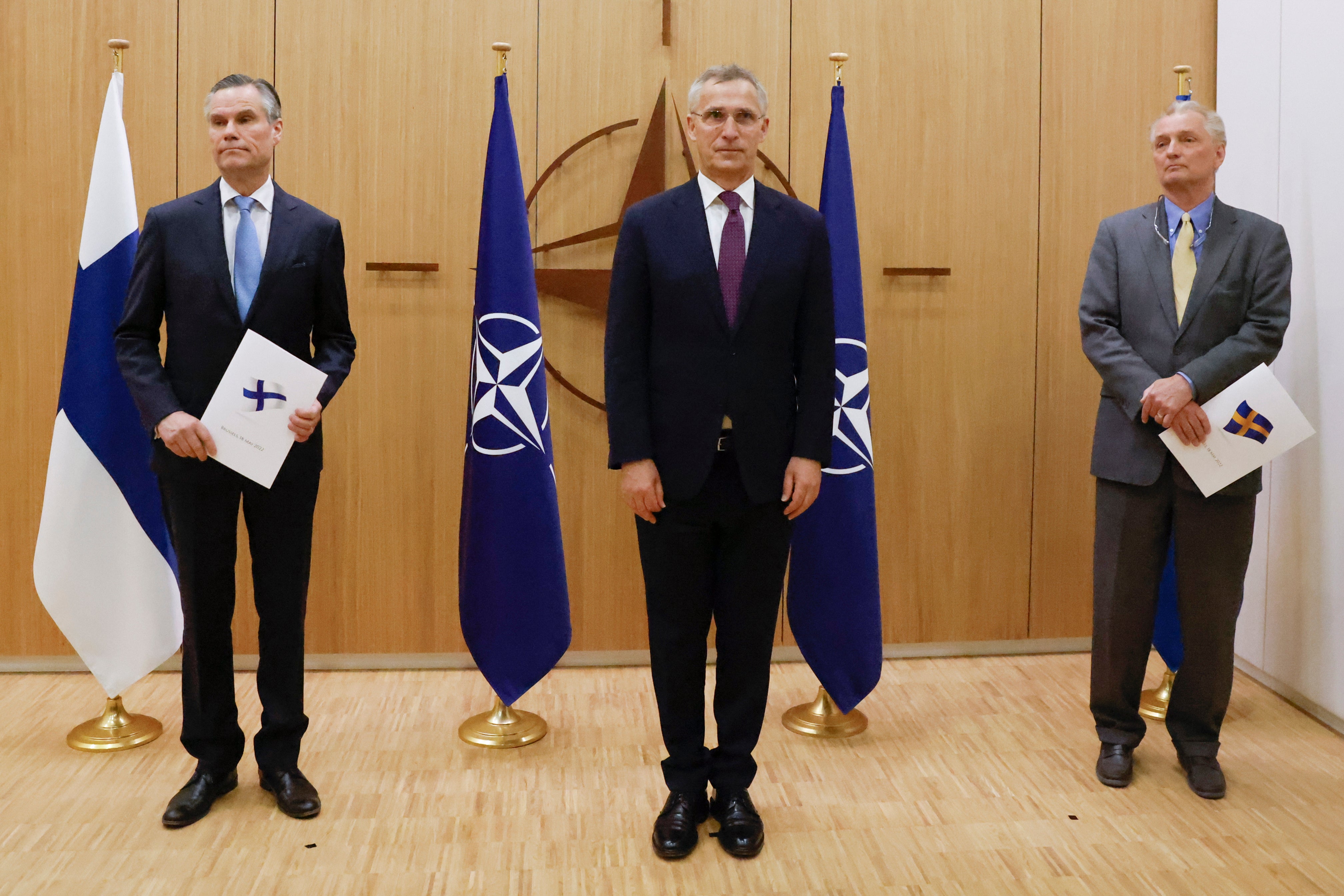 Finland’s ambassador to Nato Klaus Korhonen, Nato secretary-general Jens Stoltenberg and Sweden’s ambassador to Nato Axel Wernhoff