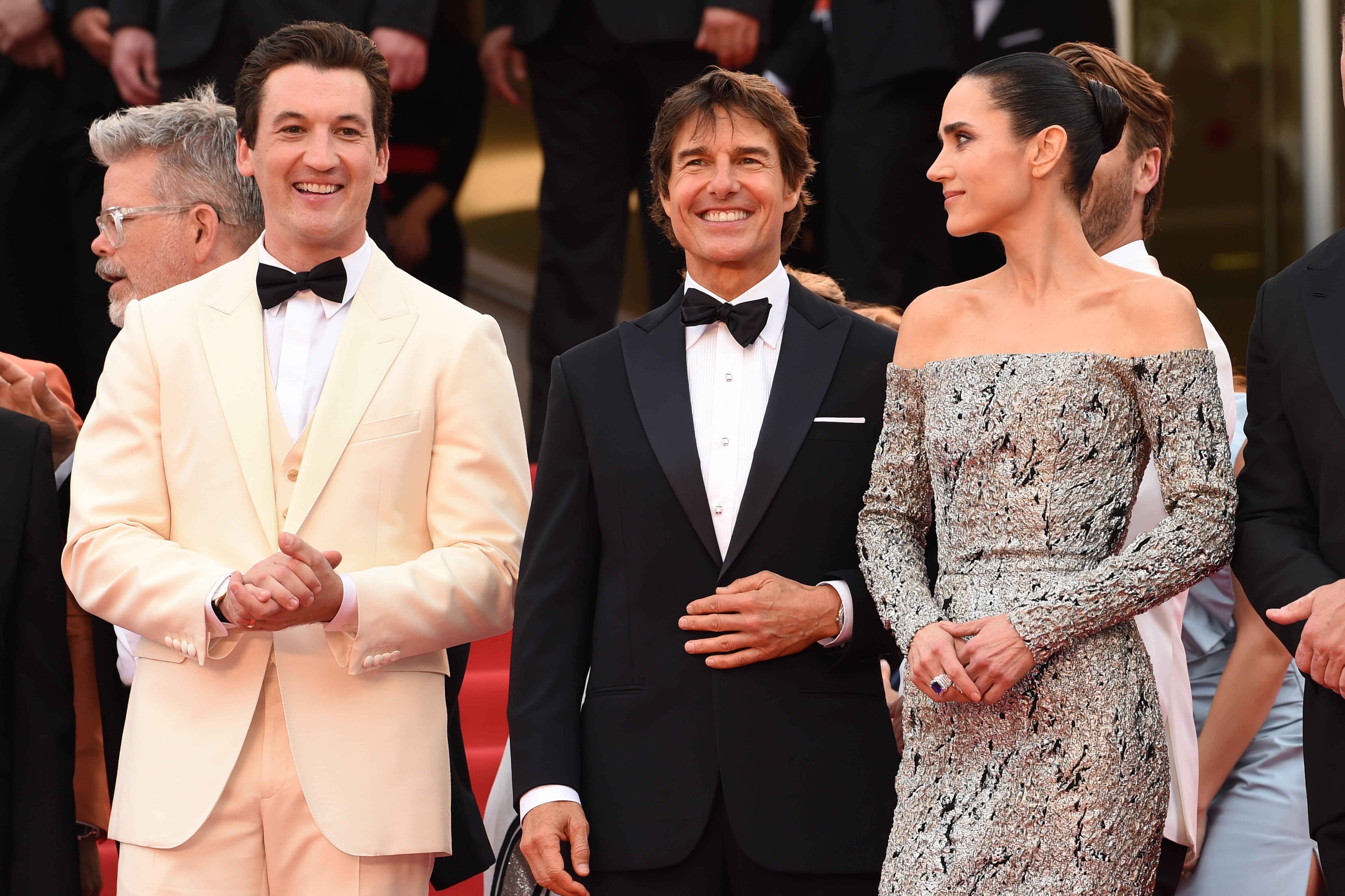 Miles Teller, Tom Cruise and Jennifer Connelly attend the ‘Top Gun: Maverick’ premiere during the 75th Cannes Film Festival