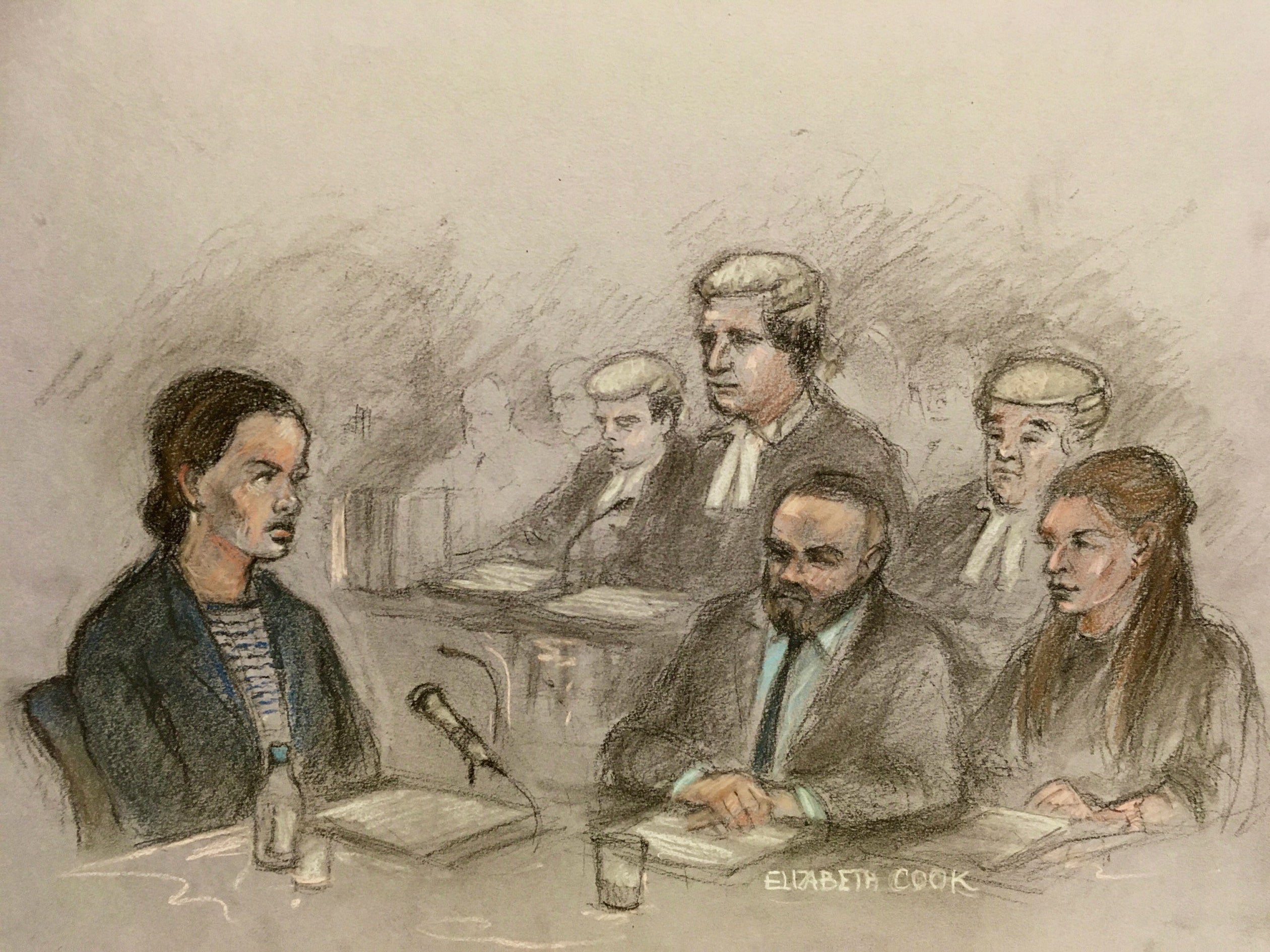 Court sketch of Rebekah Vardy giving evidence in the ‘Wagatha Christie’ trial as Coleen Rooney and her husband Wayne watch on (Elizabeth Cook/PA)