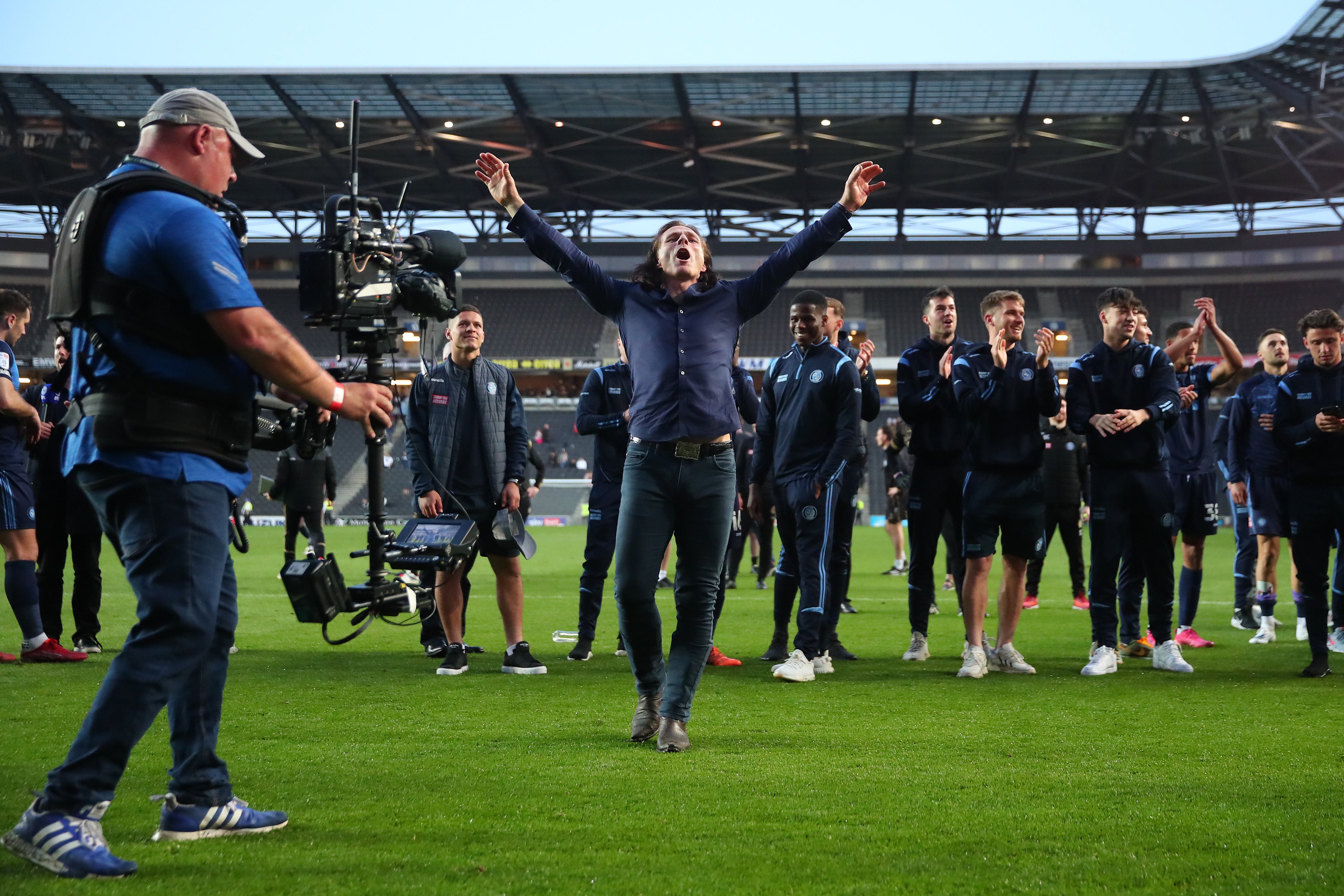 Gareth Ainsworth leads Wycombe’s celebrations in the League One play-offs