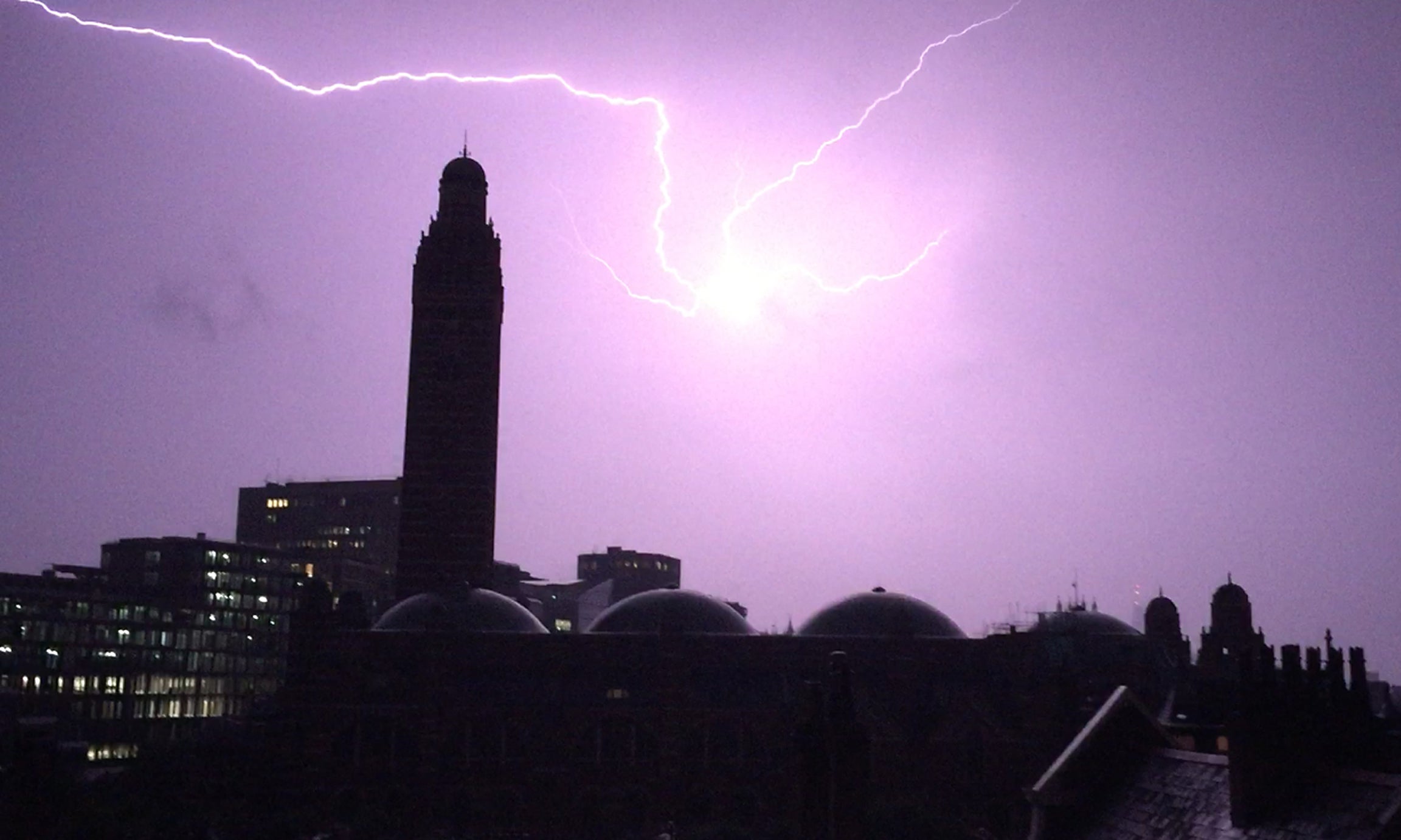 Lightning flashes over the tower of Westminster Cathedral (Adam Peck/PA)