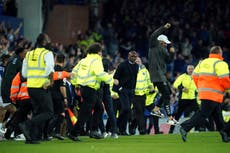 Patrick Vieira kicks fan during pitch invasion after Crystal Palace defeat by Everton