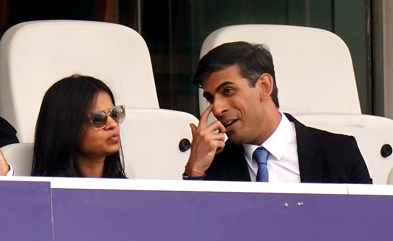 Chancellor of the Exchequer Rishi Sunak alongside his wife Akshata Murty (Zac Goodwin/PA)