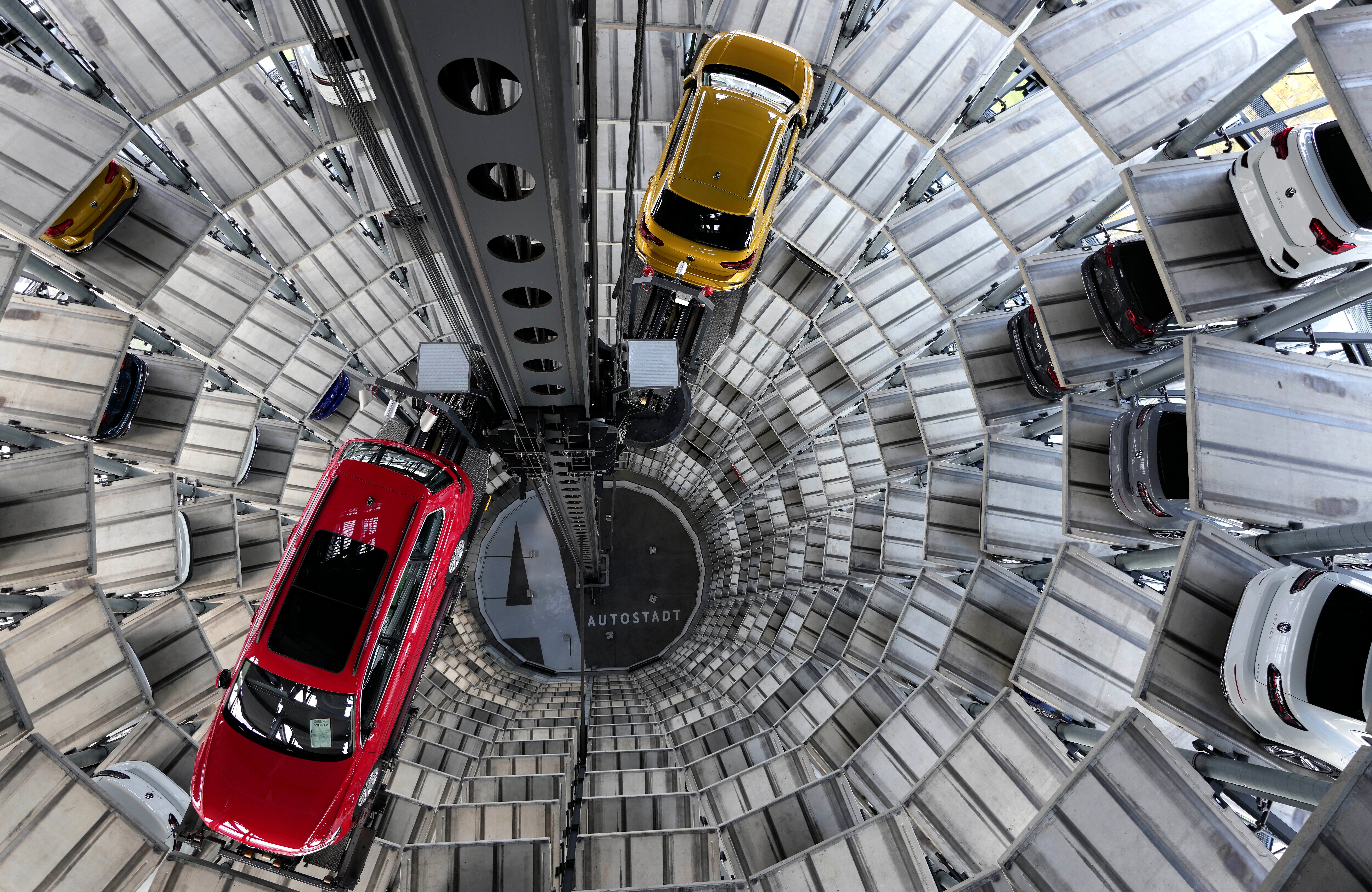 Cars ready for handing over inside one of in total two ‘car towers’ at the Volkswagen car factory in Wolfsburg, Germany