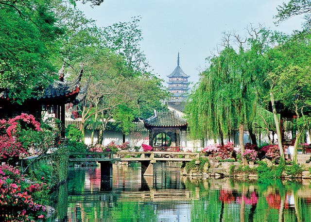 <p>A tower in the distance is part of the view at the Humble Administrator’s Garden in Suzhou</p>