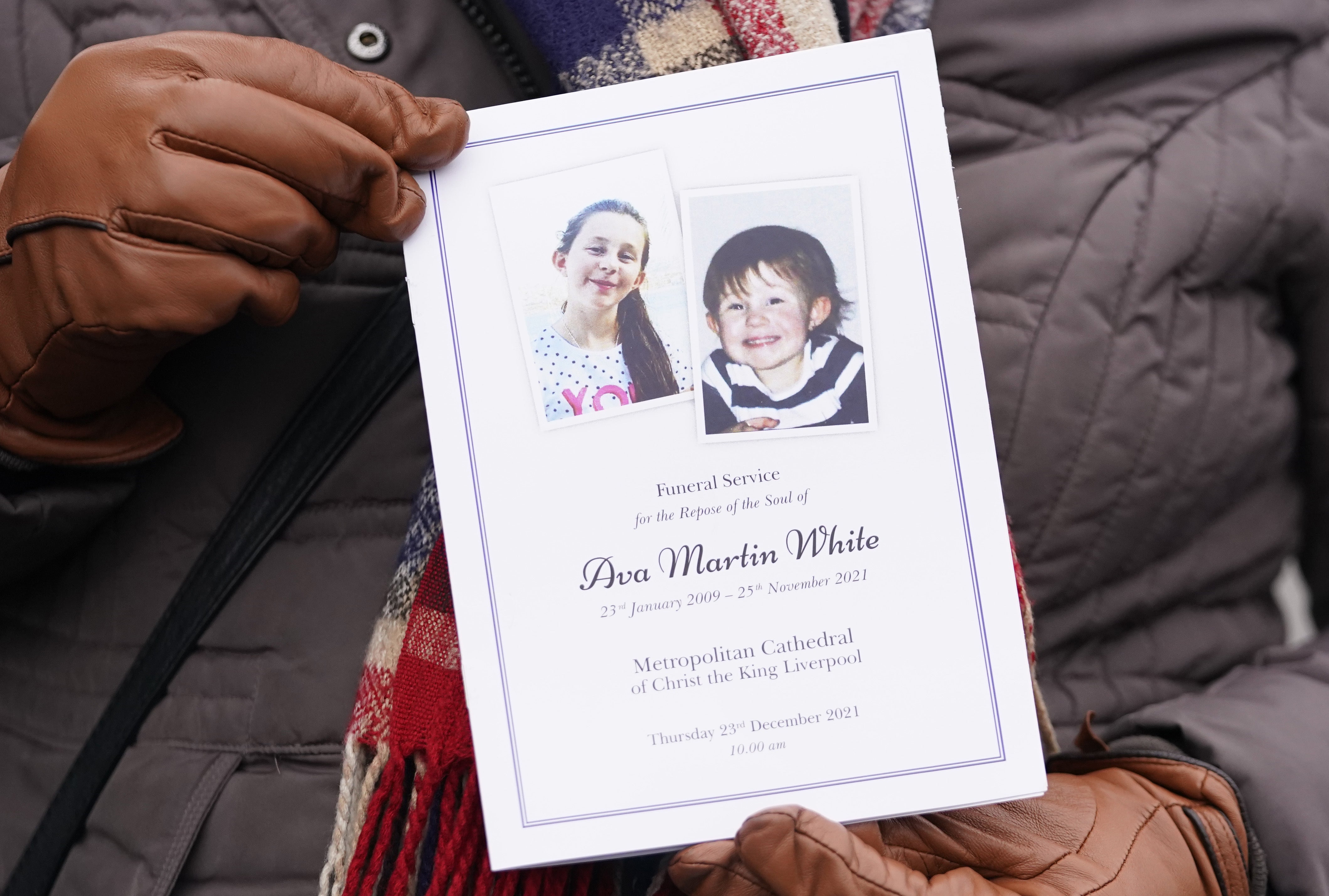 A person holds the order of service at Liverpool Metropolitan Cathedral ahead of the funeral of Ava White, 12 (Danny Lawson/PA)