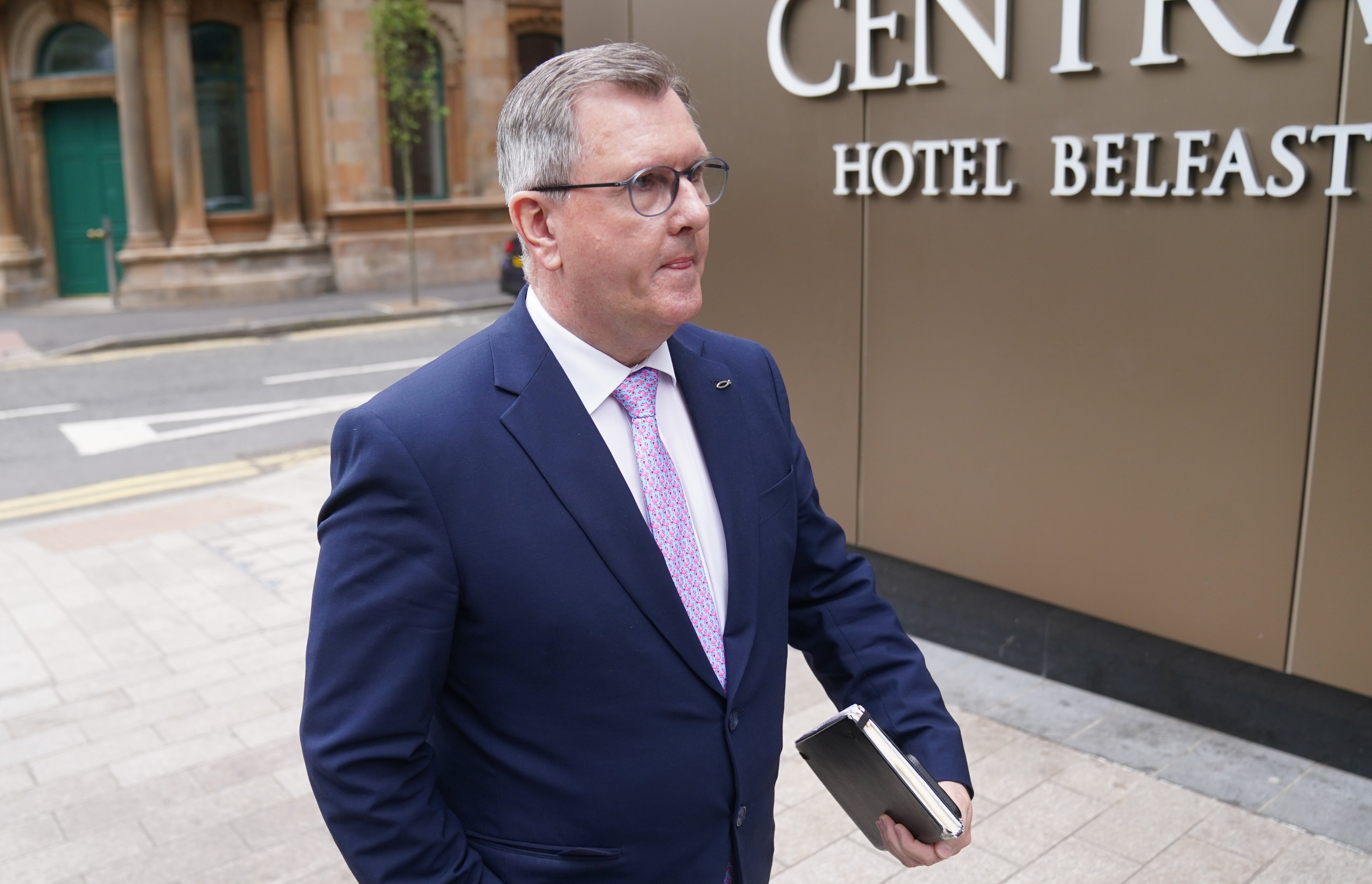 DUP leader Sir Jeffrey Donaldson arrives at the Grand Central Hotel in Belfast, ahead of his meeting with Taoiseach Micheal Martin (Brian Lawless/PA)