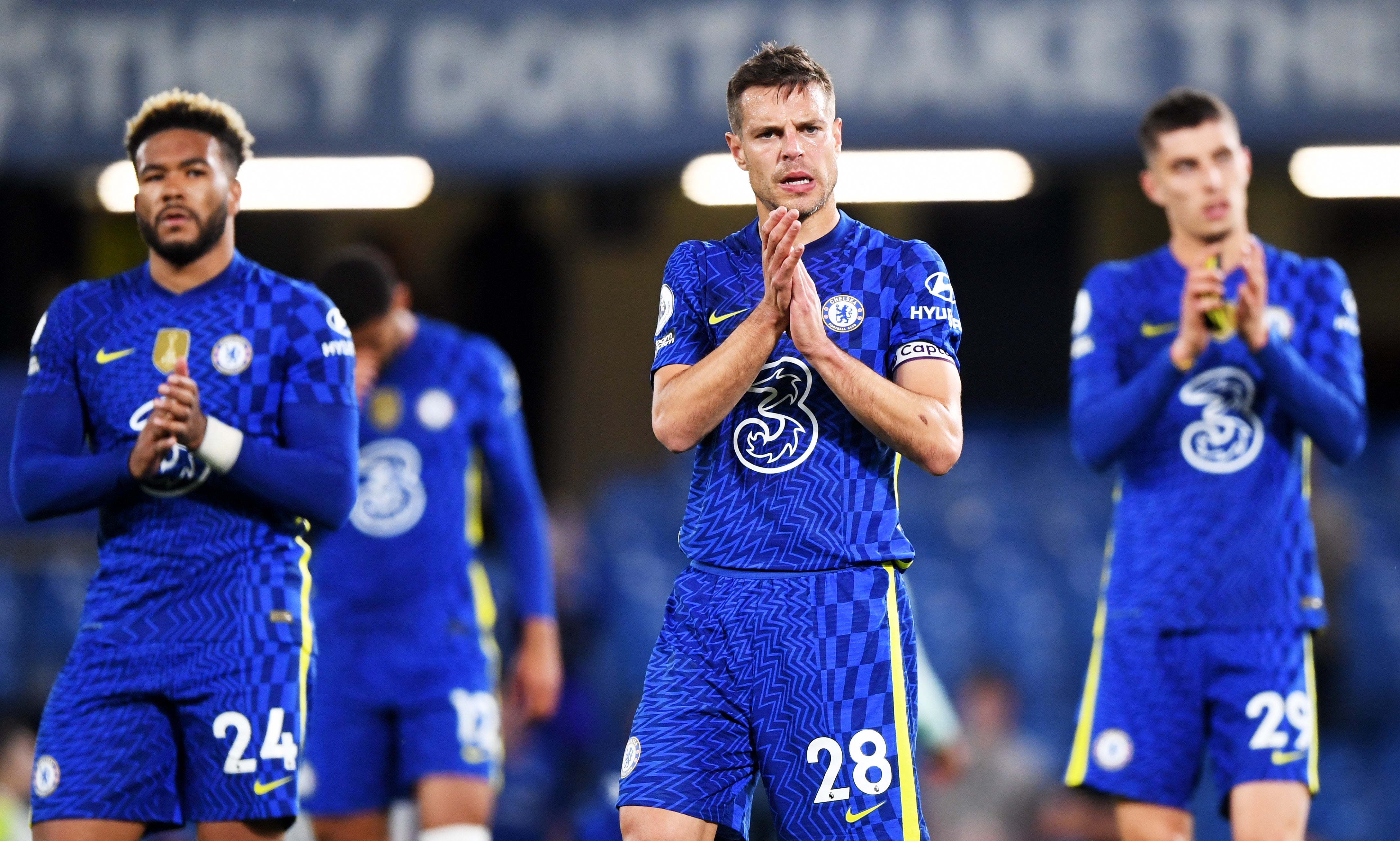 Cesar Azpilicueta of Chelsea and teammates applaud fans