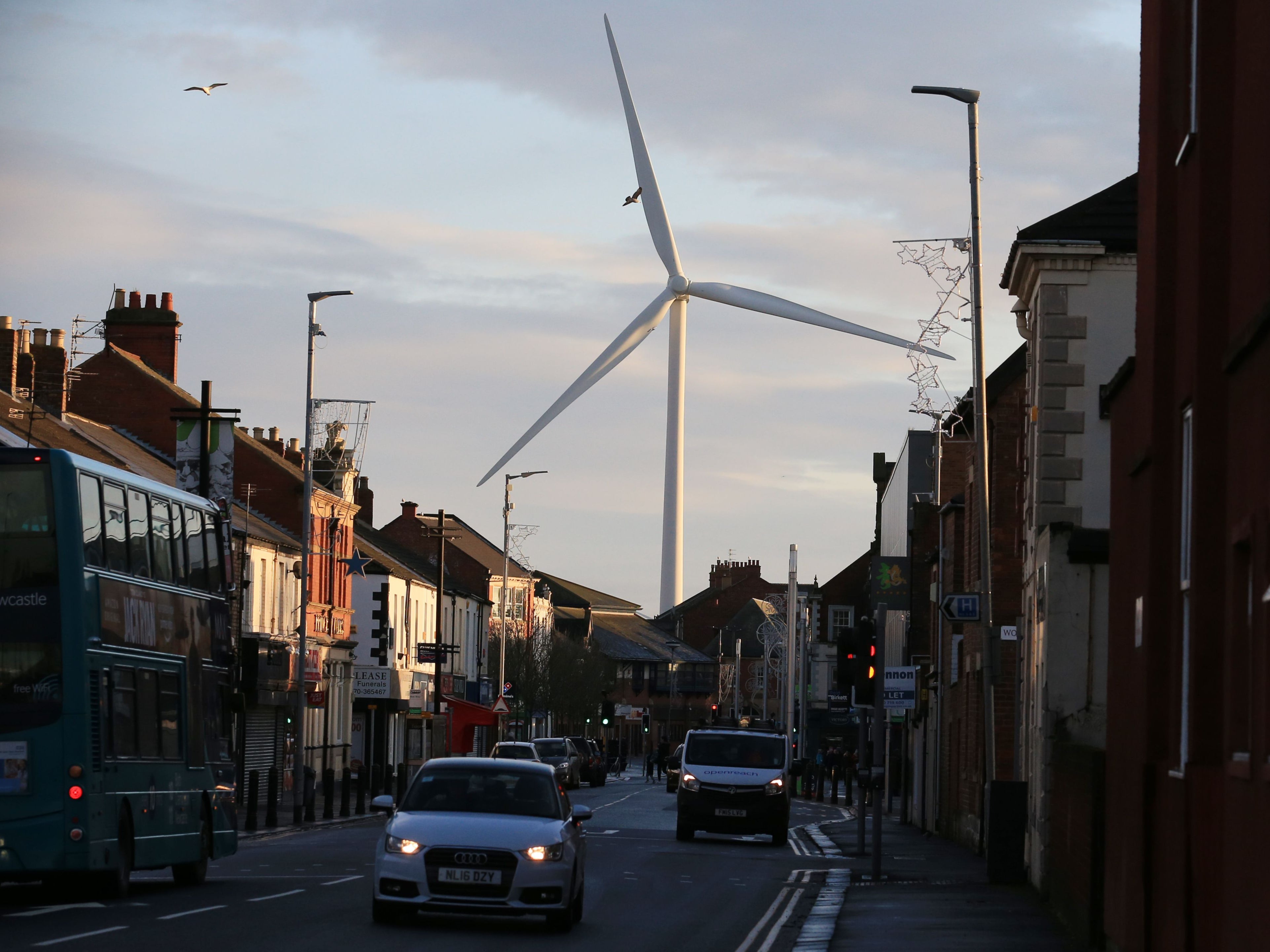 A wind turbine overlooks the former mining town of Blyth