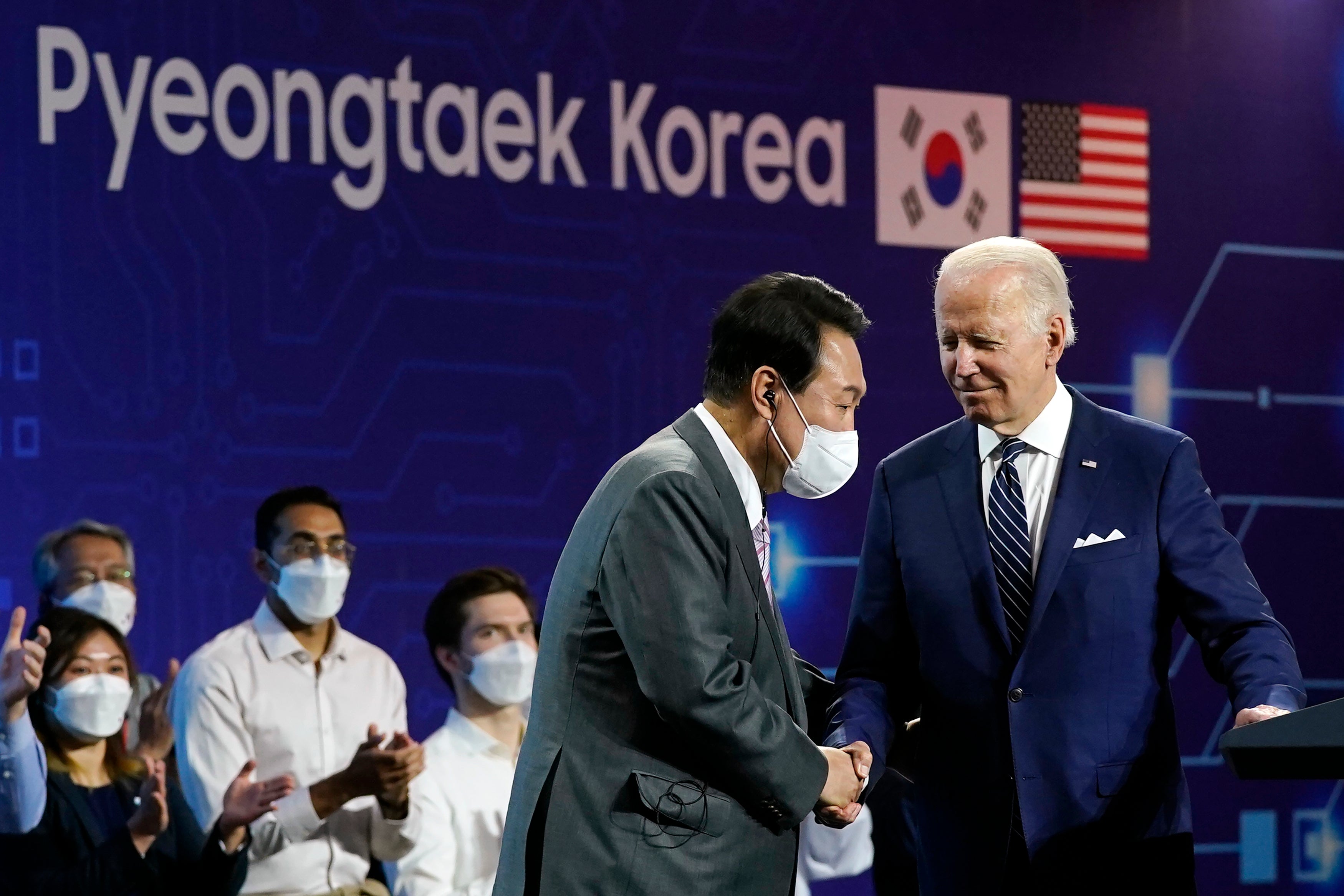 US president Joe Biden and his South Korean counterpart Yoon Suk-yeol deliver remarks at the Samsung Electronics Pyeongtaek campus on 20 May in Pyeongtaek, South Korea