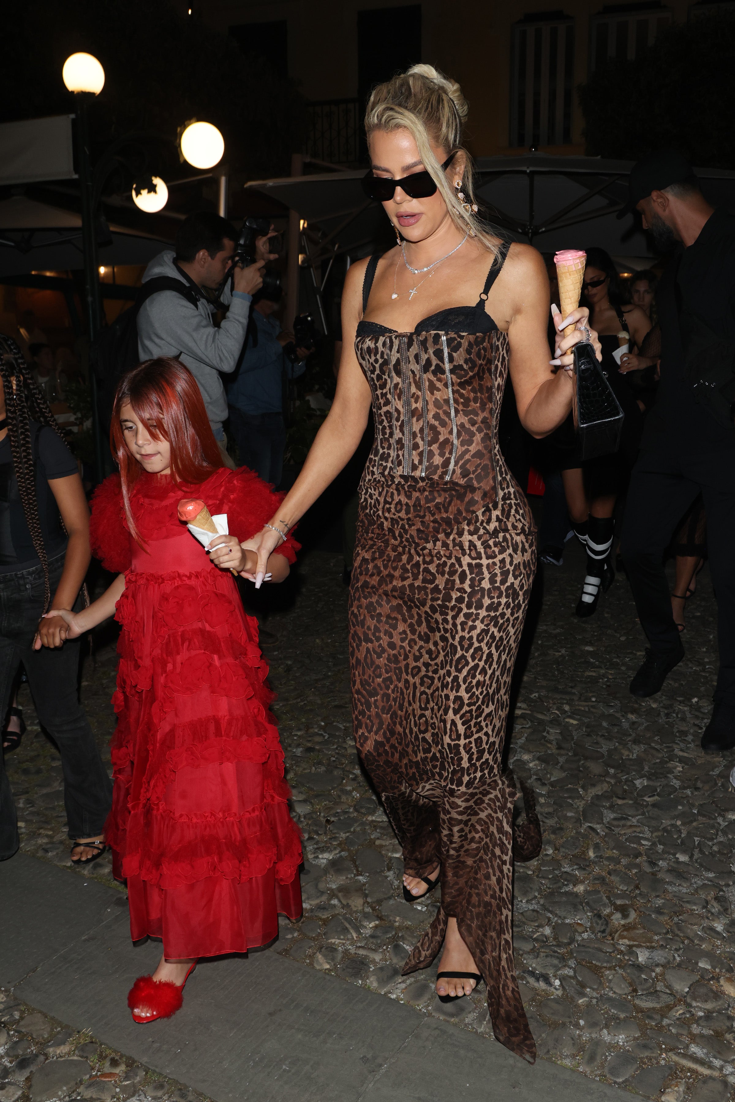 Khloe wore a leopard print dress