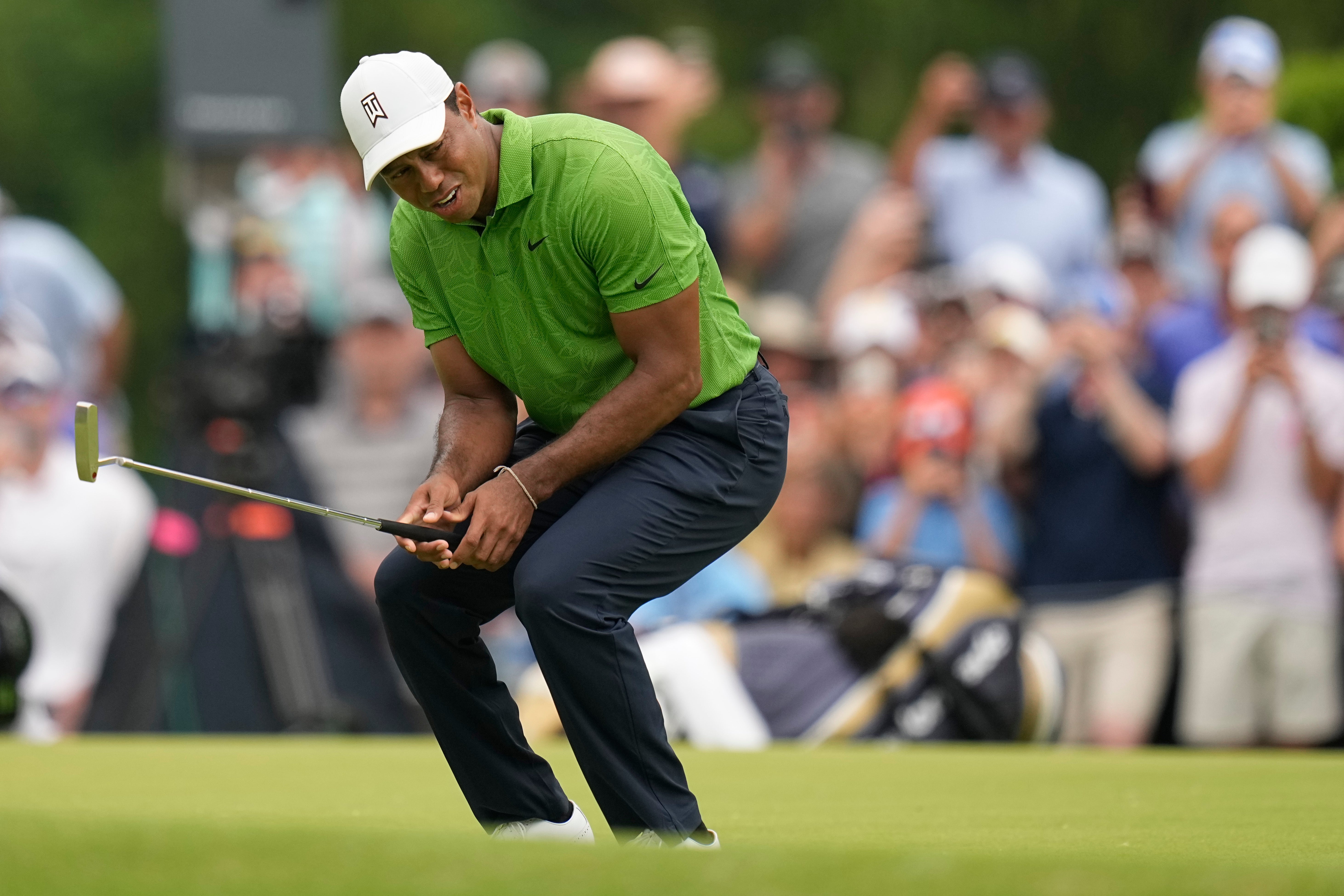 Tiger Woods battled hard to make the halfway cut in the US PGA Championship (Eric Gay/AP)