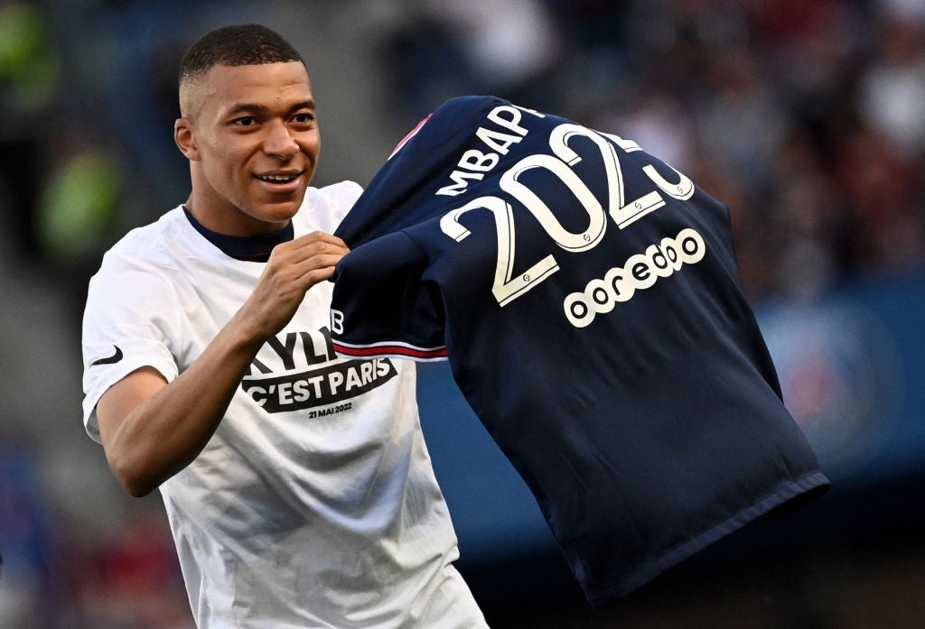 Mbappe salutes supporters after the announcement he staying at PSG until 2025