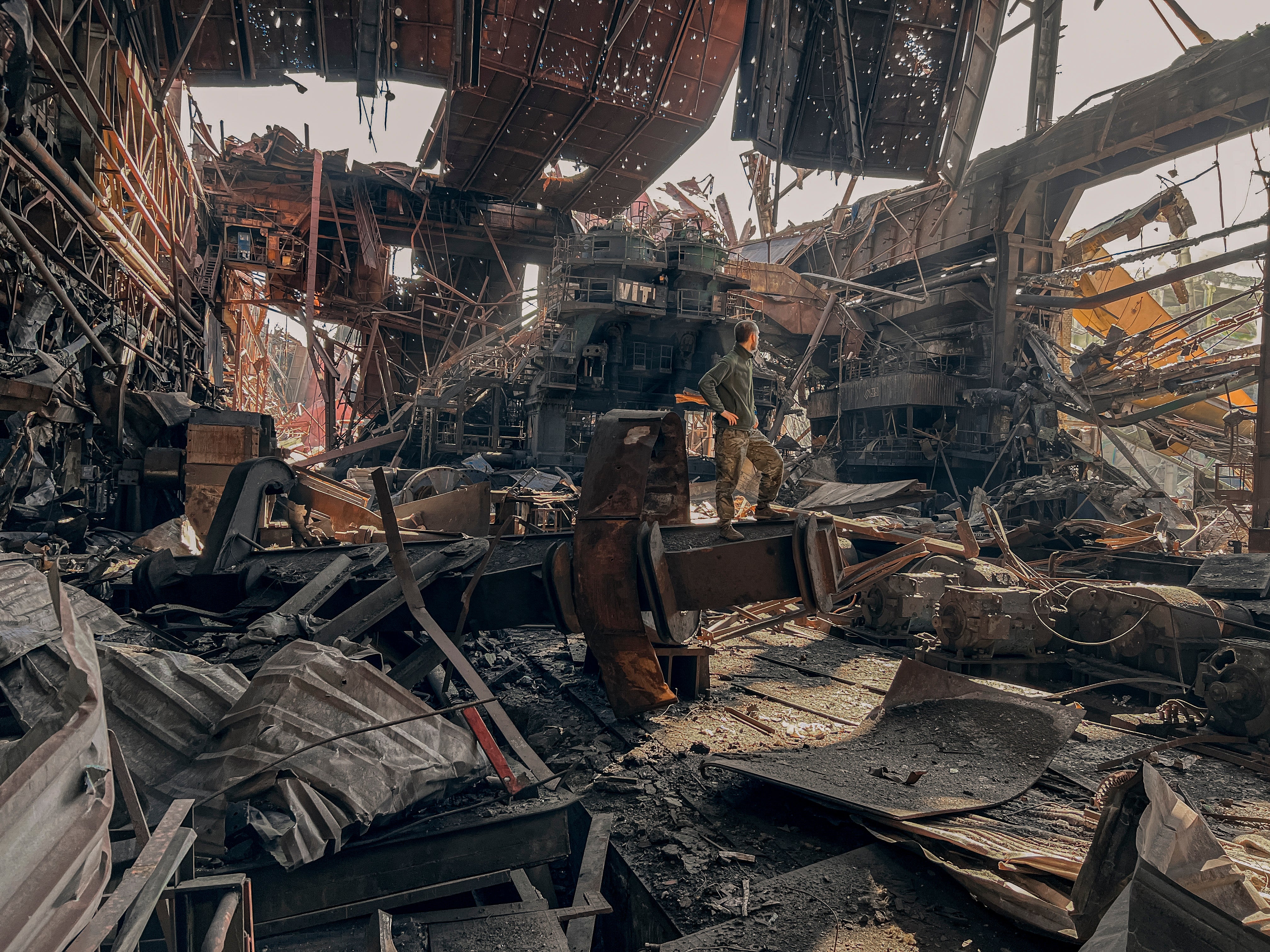 Ukrainian soldier stands inside the ruined Azovstal steel plant prior to surrender to the Russian forces