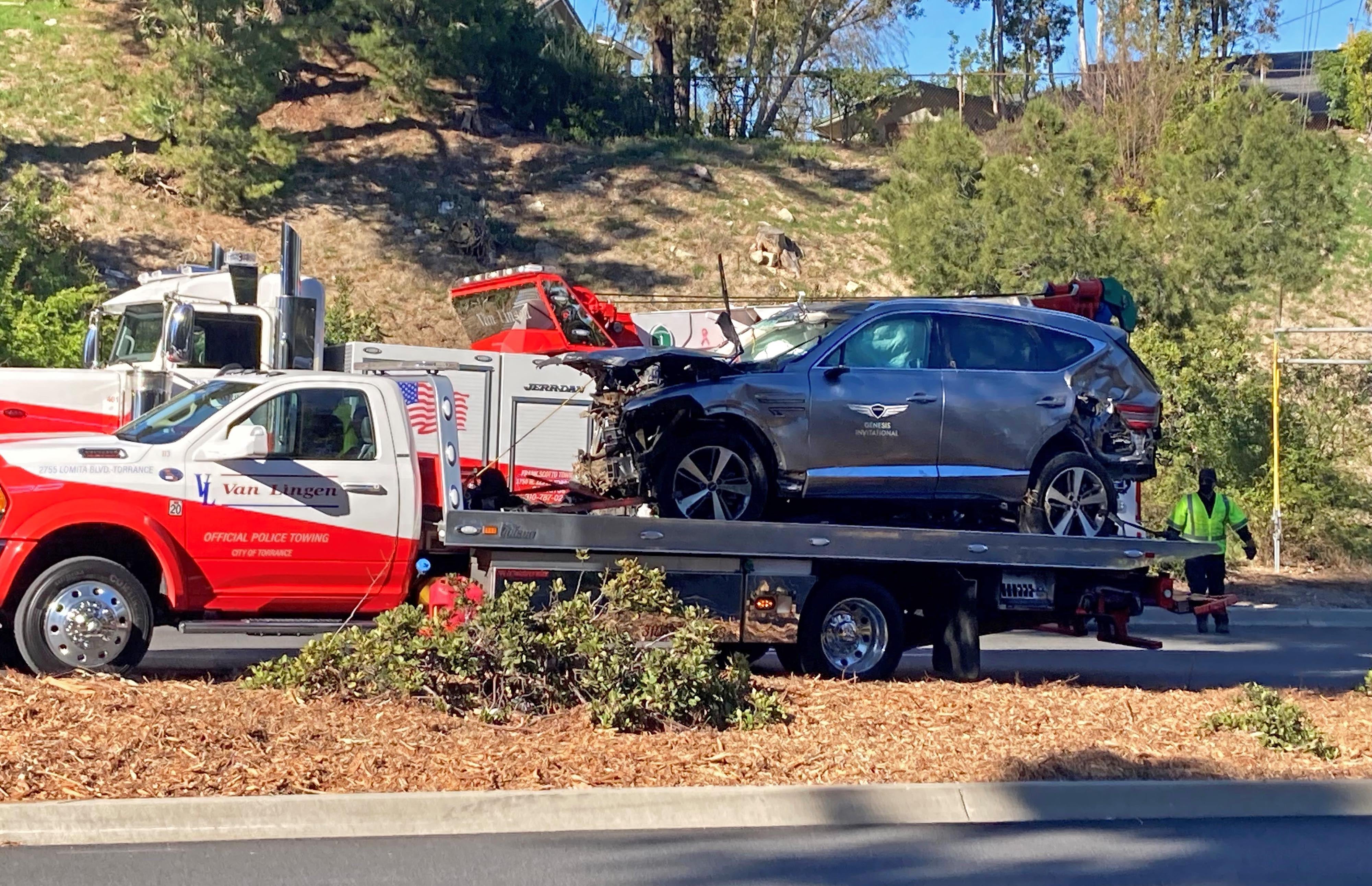 The vehicle driven by Tiger Woods in the 2021 crash on the back of a truck in Los Angeles (Keiran Southern/PA)