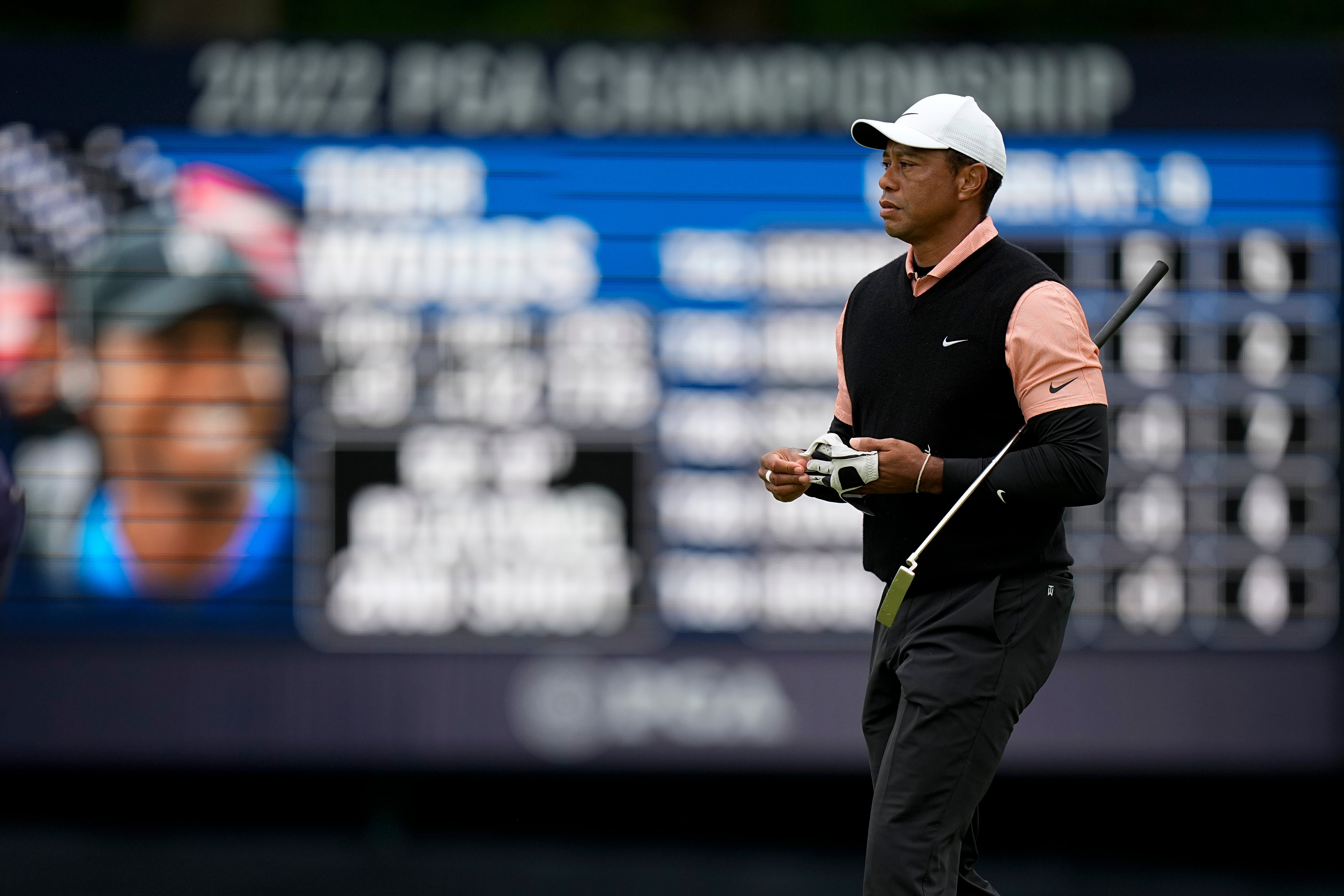 Tiger Woods walks on the 17th green during the third round of the US PGA Championship (Eric Gay/AP)